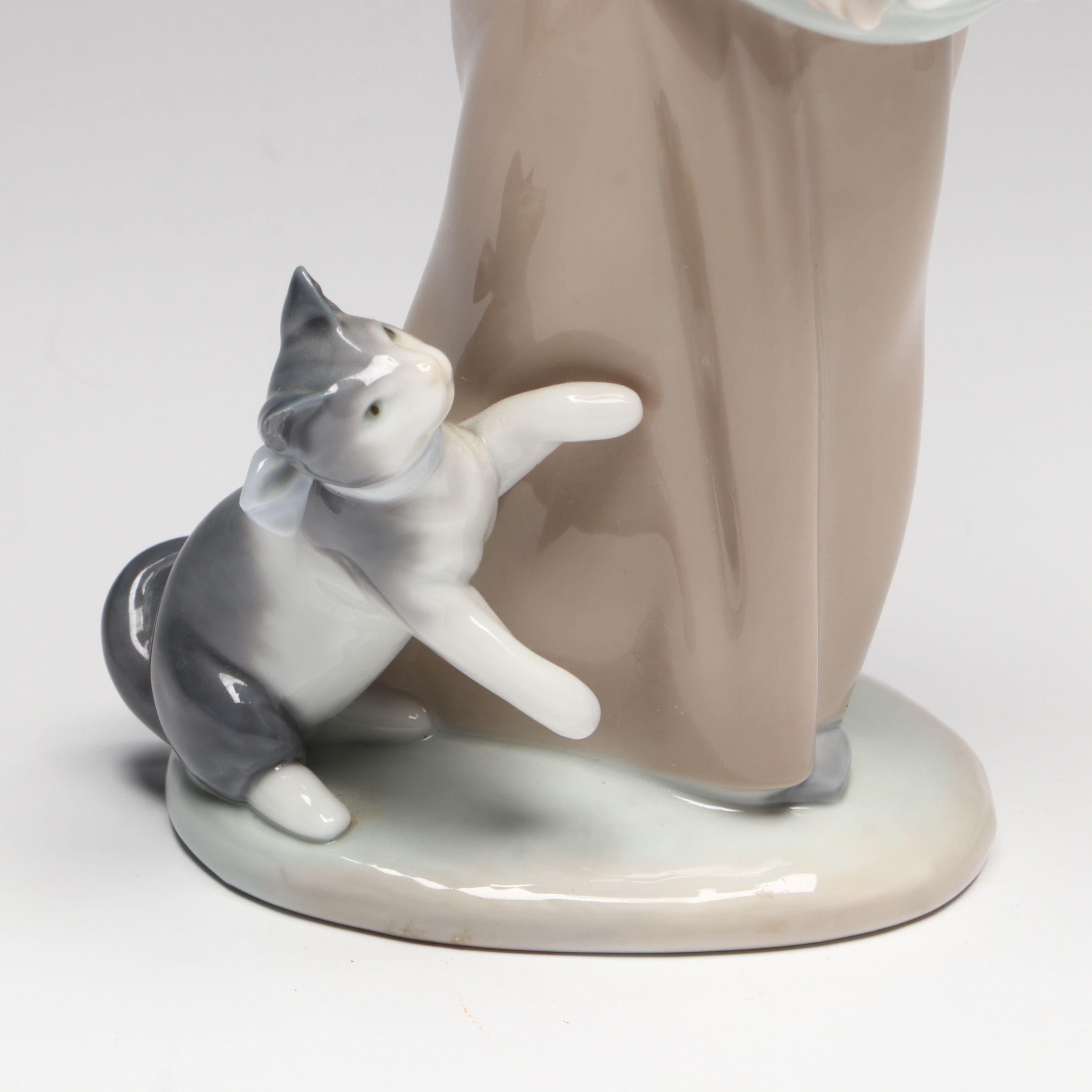 Lladró "Following Her Cats" Porcelain Figurine and Annual Porcelain Bells