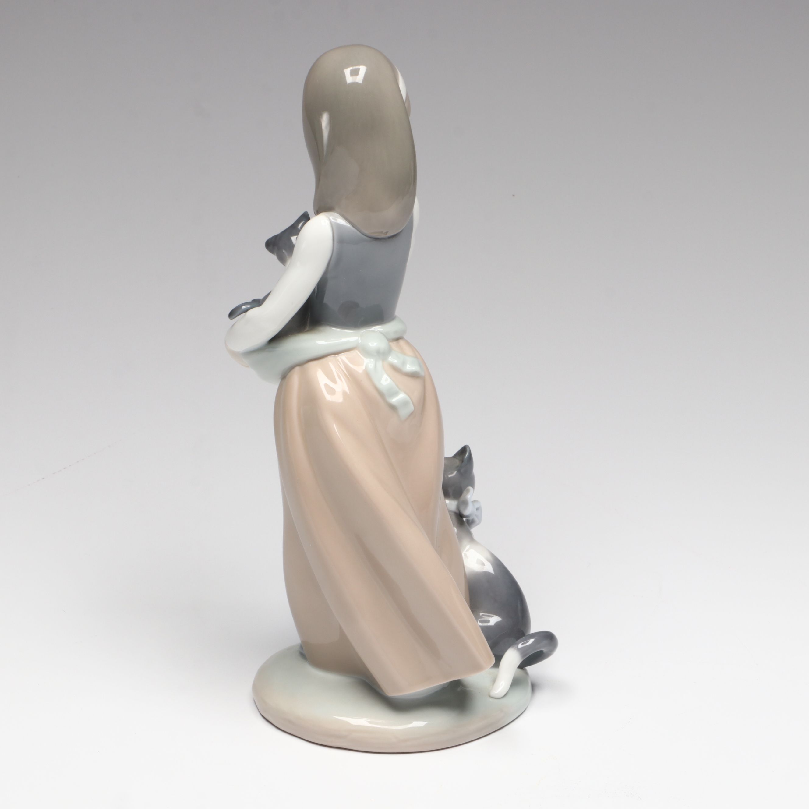 Lladró "Following Her Cats" Porcelain Figurine and Annual Porcelain Bells