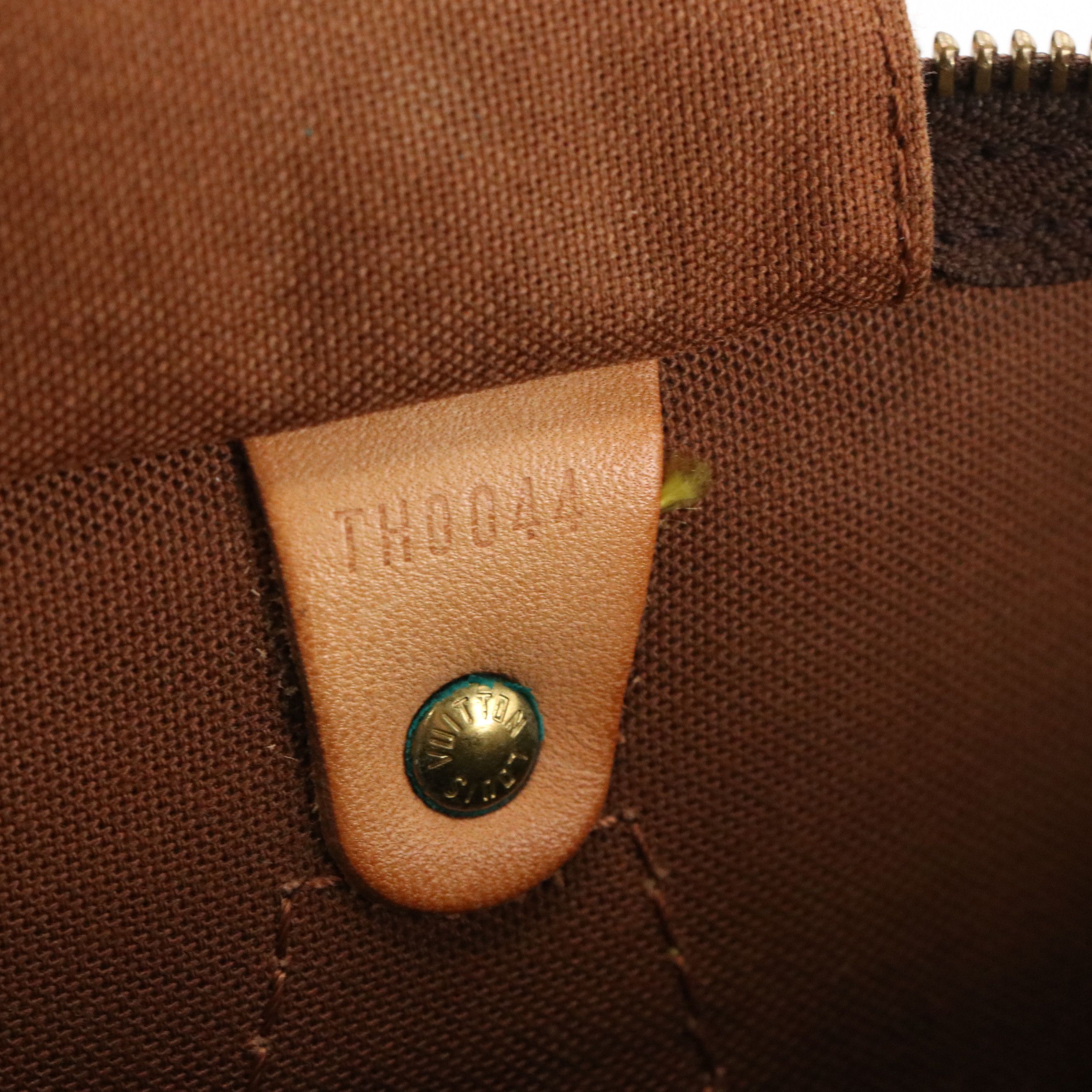 Louis Vuitton Speedy 40 Top Handle Bag in Monogram Canvas and Leather