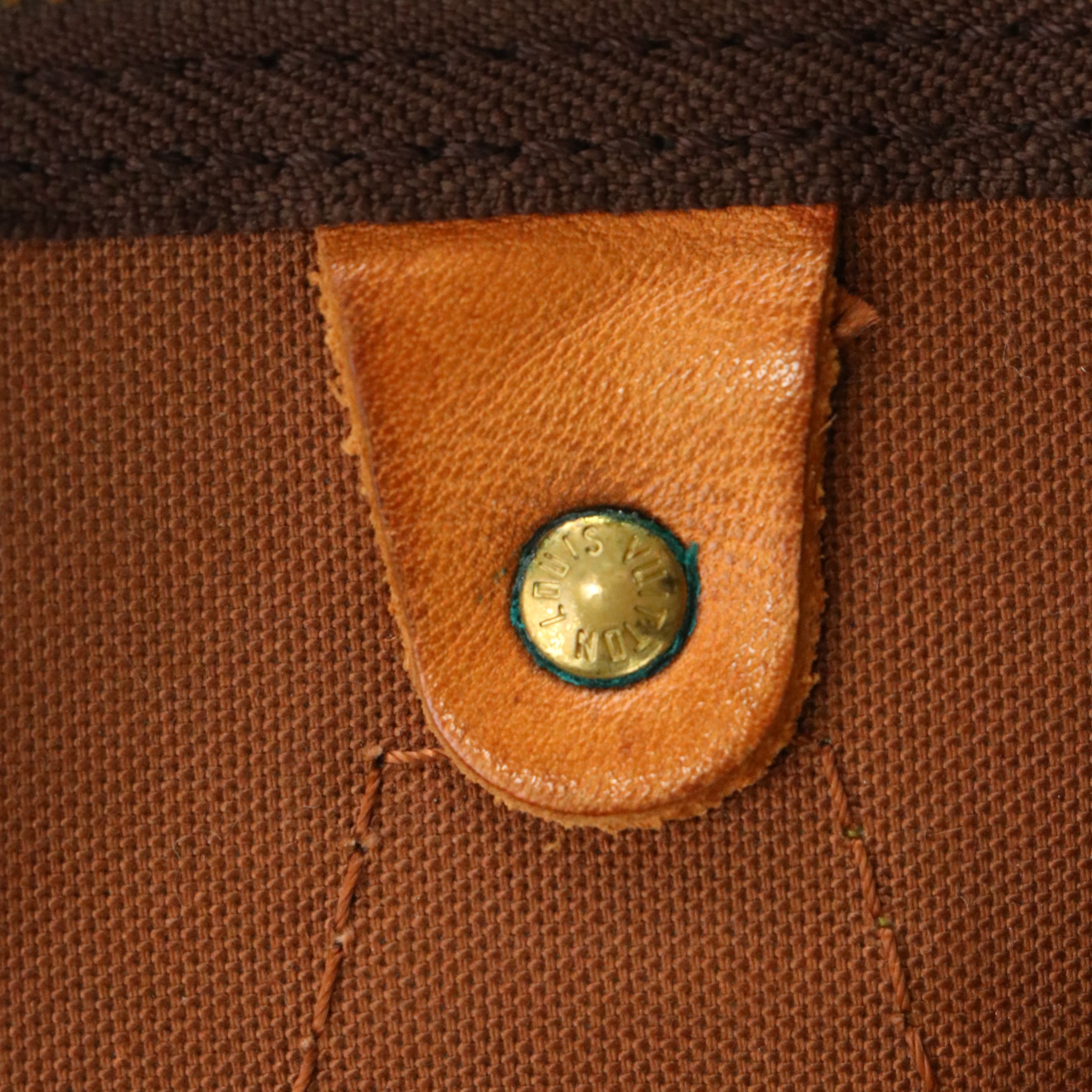 Louis Vuitton Speedy 40 Top Handle Bag in Monogram Canvas and Leather