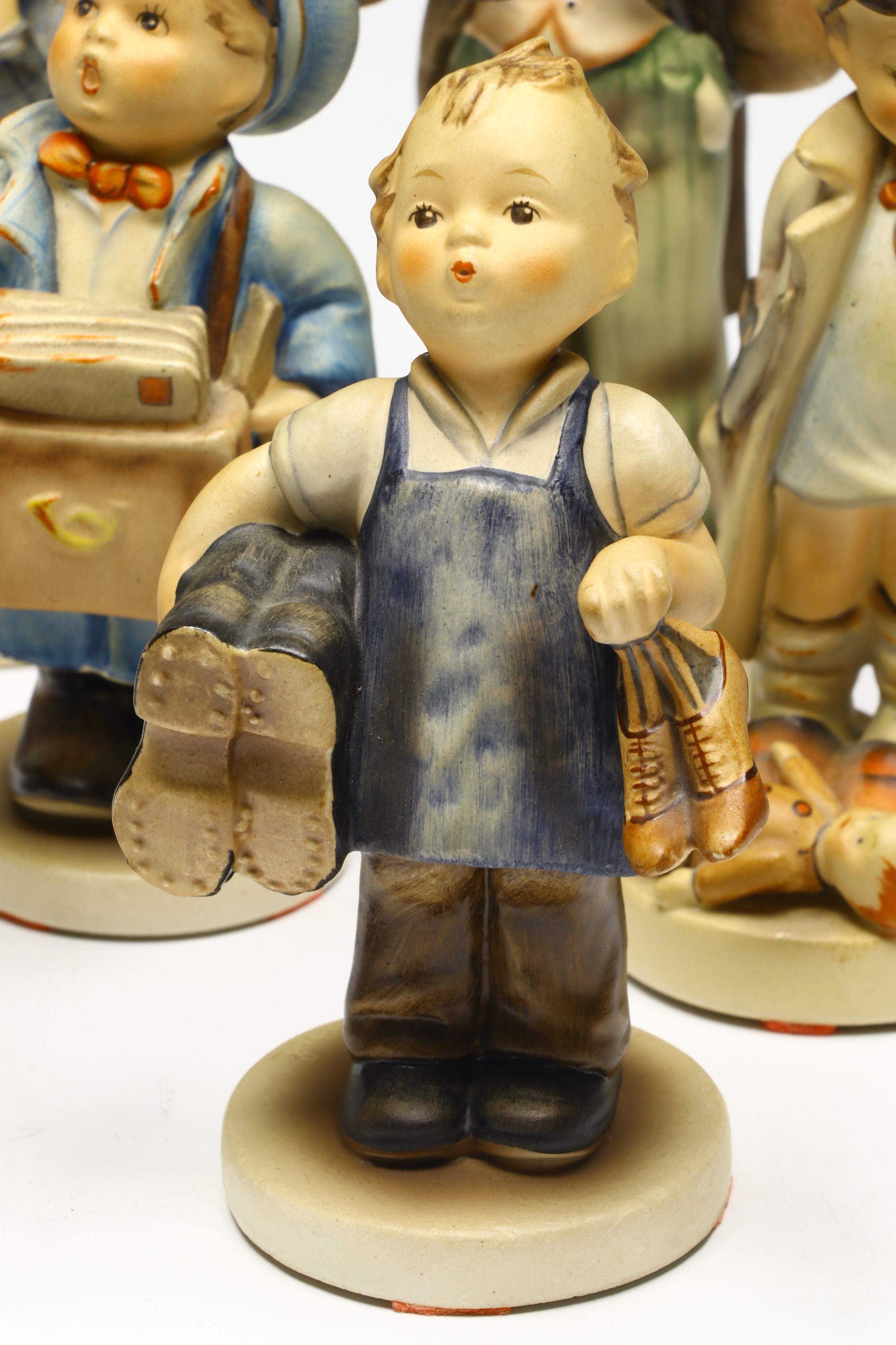 Goebel "Little Sweeper," "Hello," "Baker," and More Porcelain Figurines