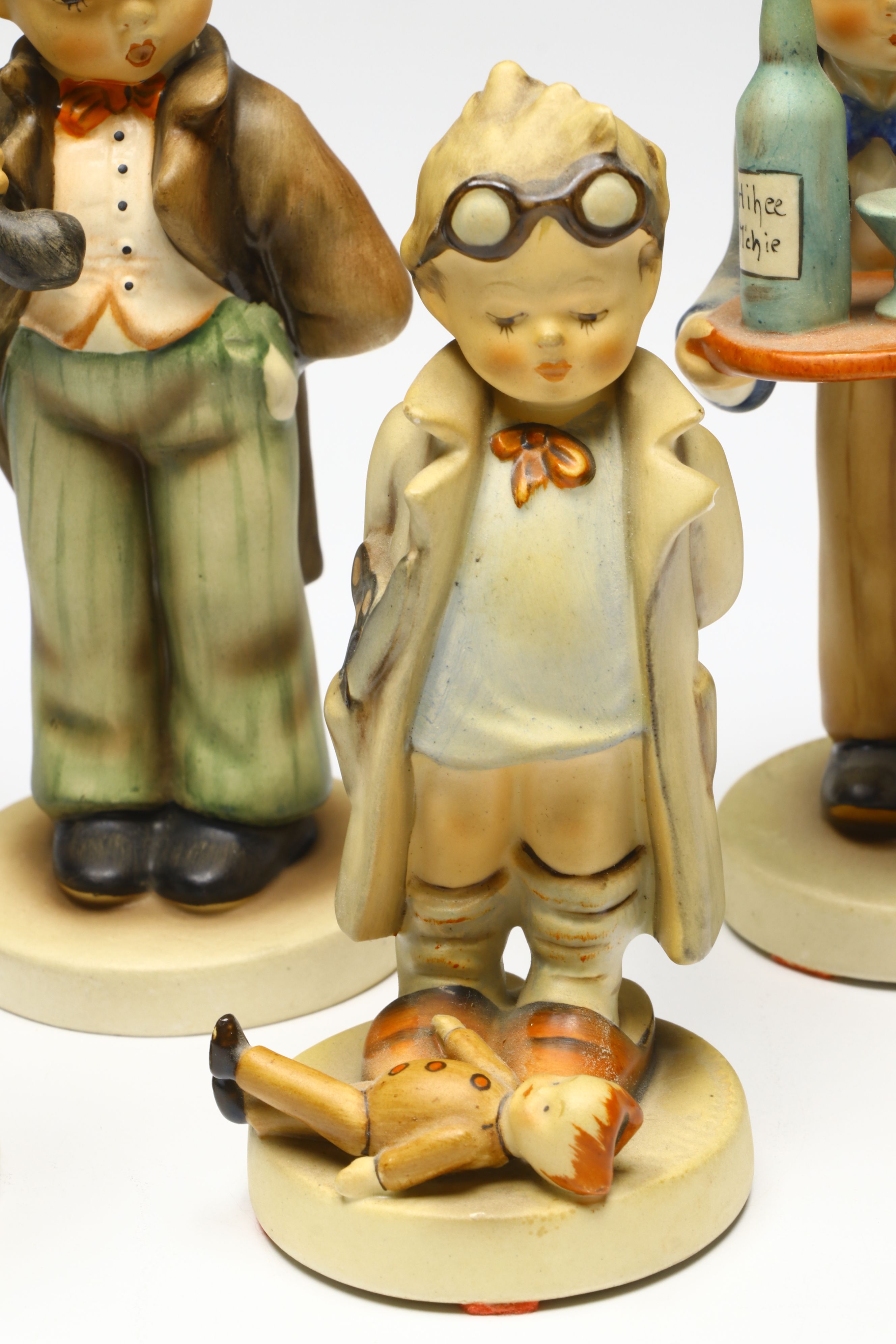 Goebel "Little Sweeper," "Hello," "Baker," and More Porcelain Figurines