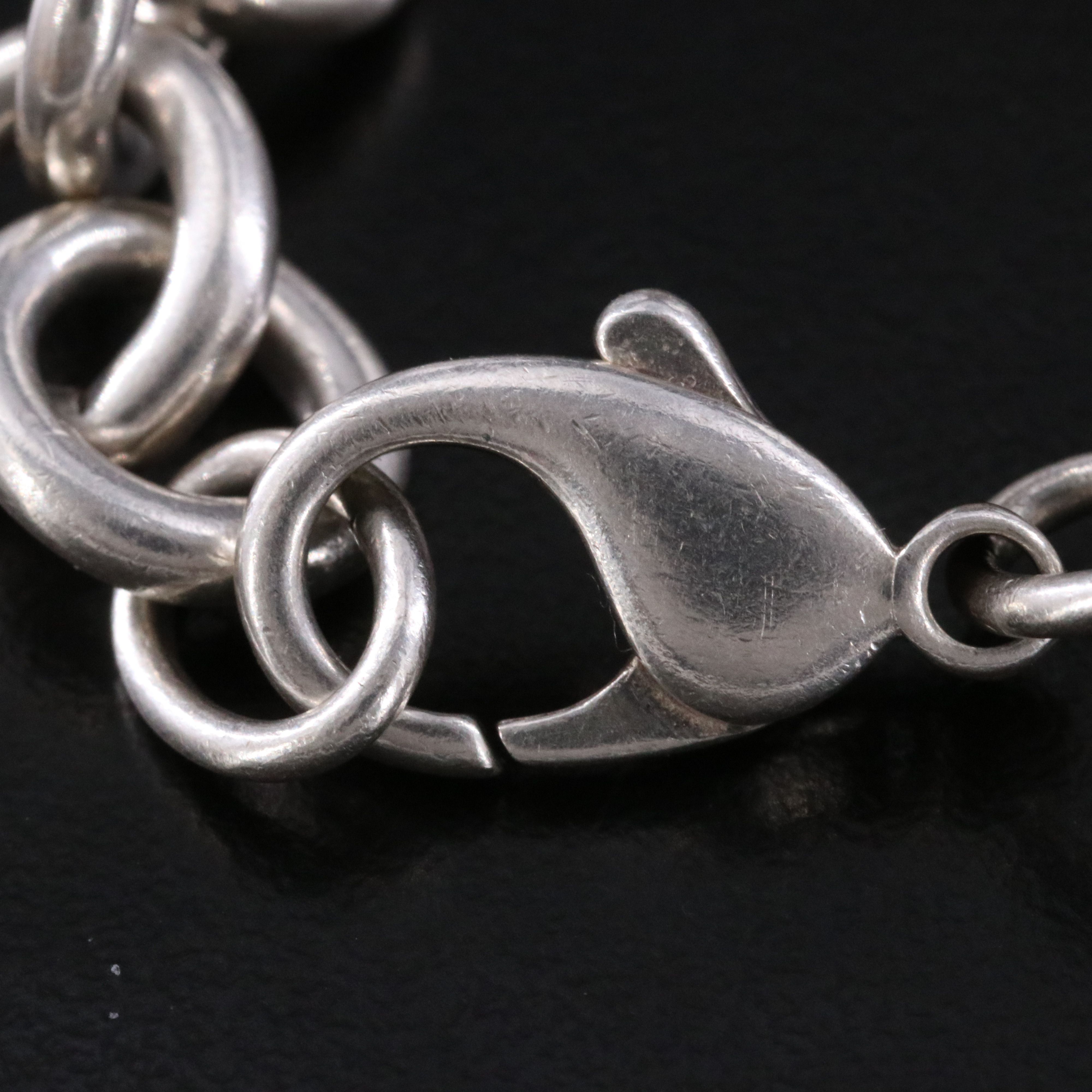 Tiffany & Co. Sterling Heart Tag Charm Bracelet