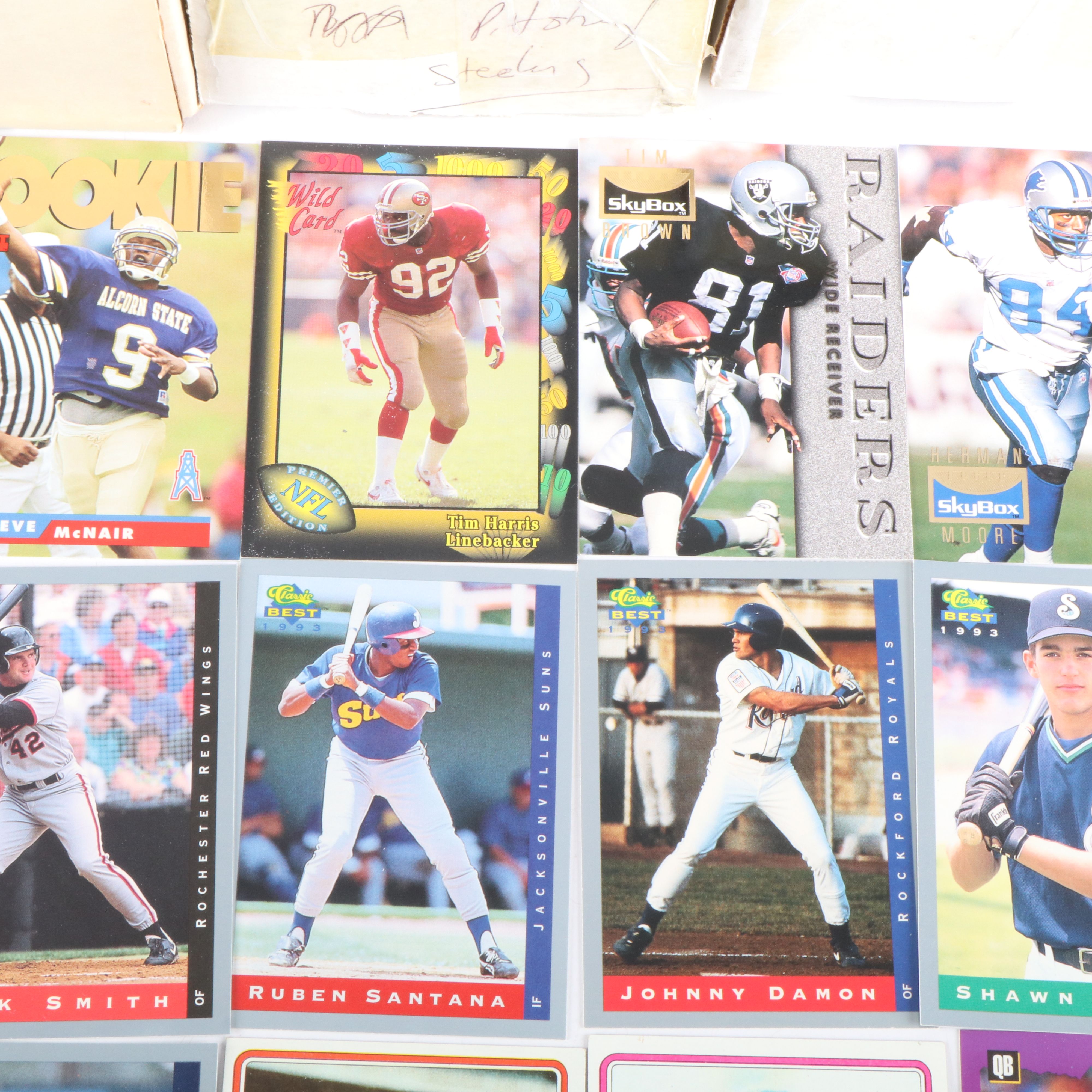 Four Boxes of Football Cards and One Box of Minor League Baseball Cards