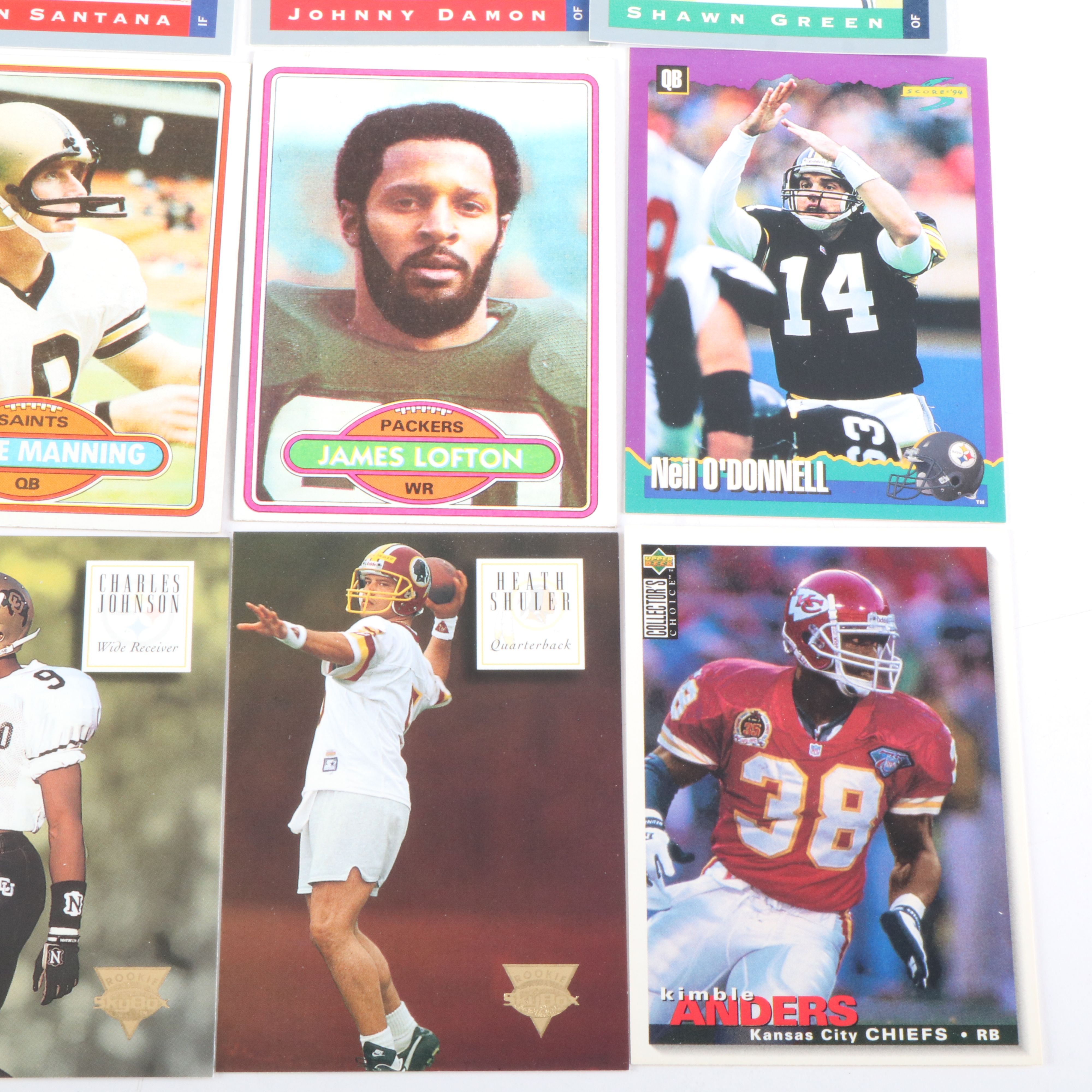 Four Boxes of Football Cards and One Box of Minor League Baseball Cards