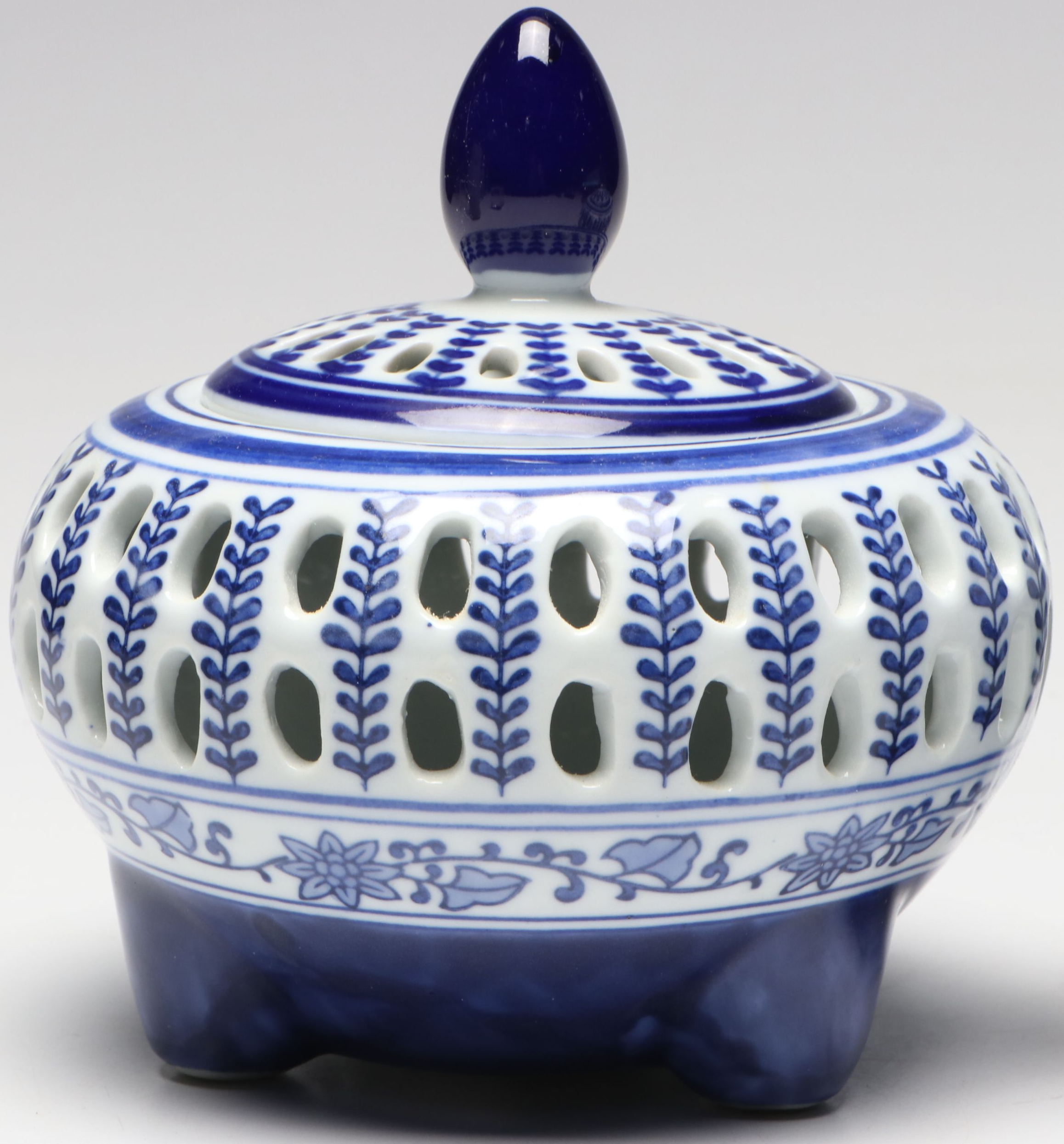 Pair of Bombay Chinese Blue and White Reticulated Porcelain Lidded Vessels
