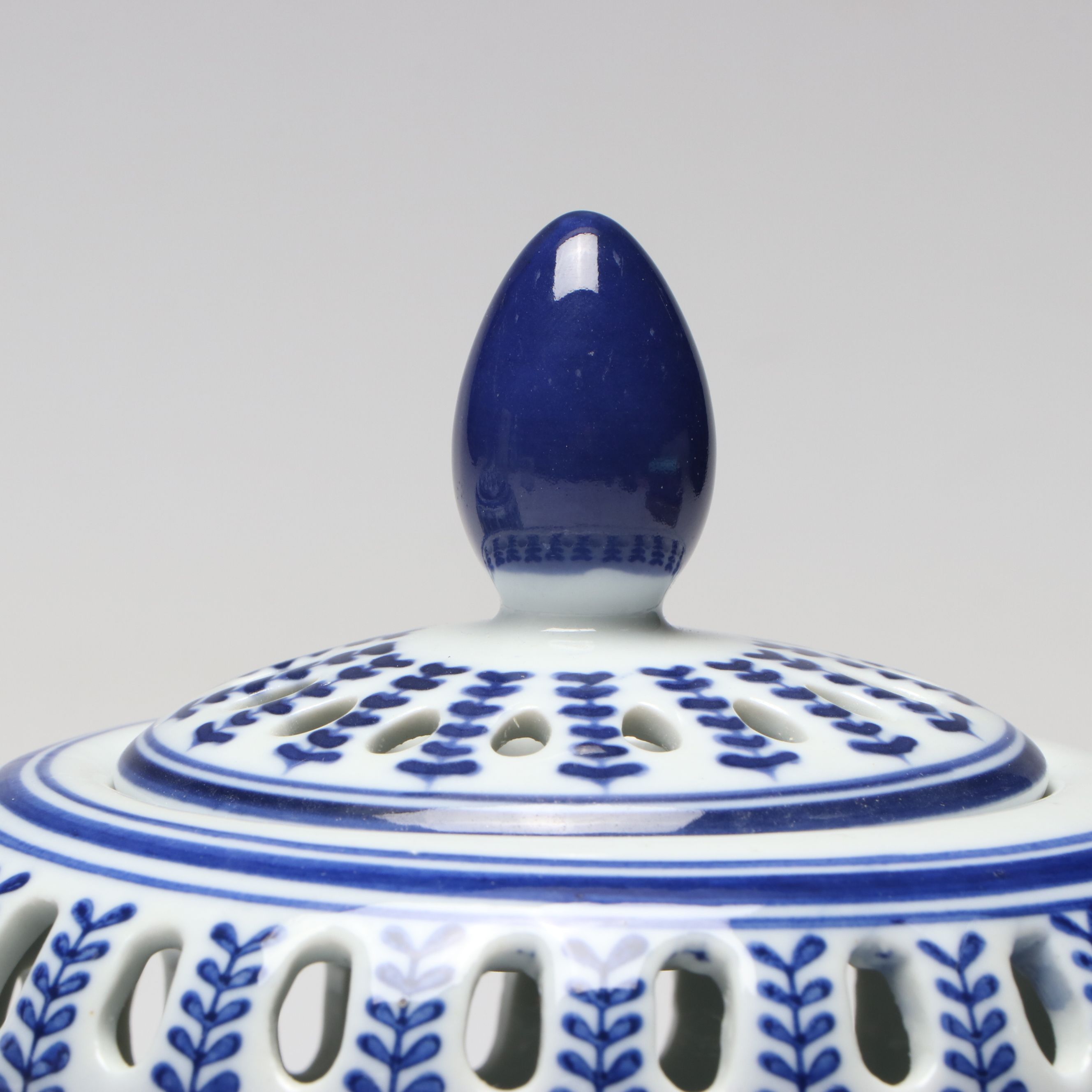 Pair of Bombay Chinese Blue and White Reticulated Porcelain Lidded Vessels