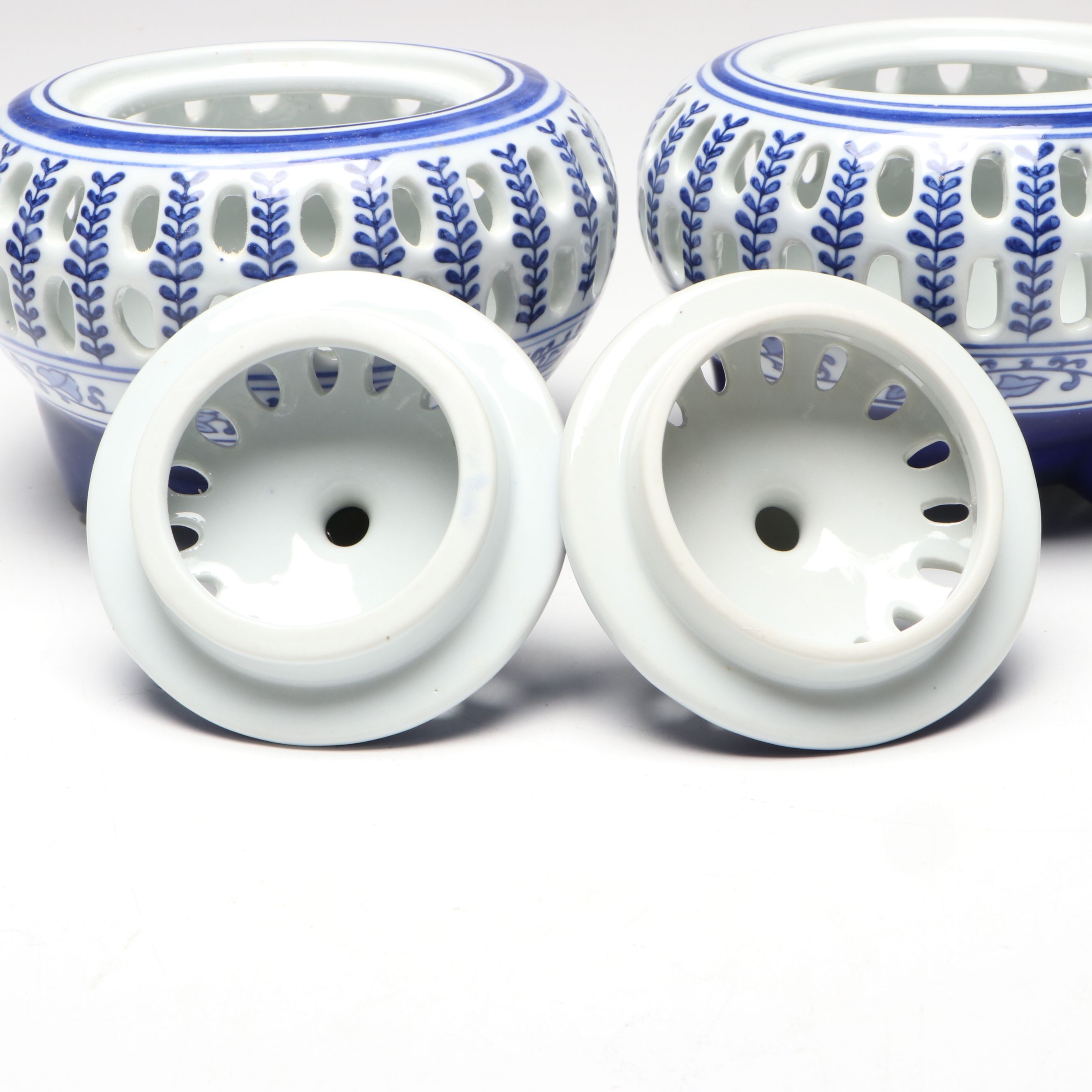 Pair of Bombay Chinese Blue and White Reticulated Porcelain Lidded Vessels