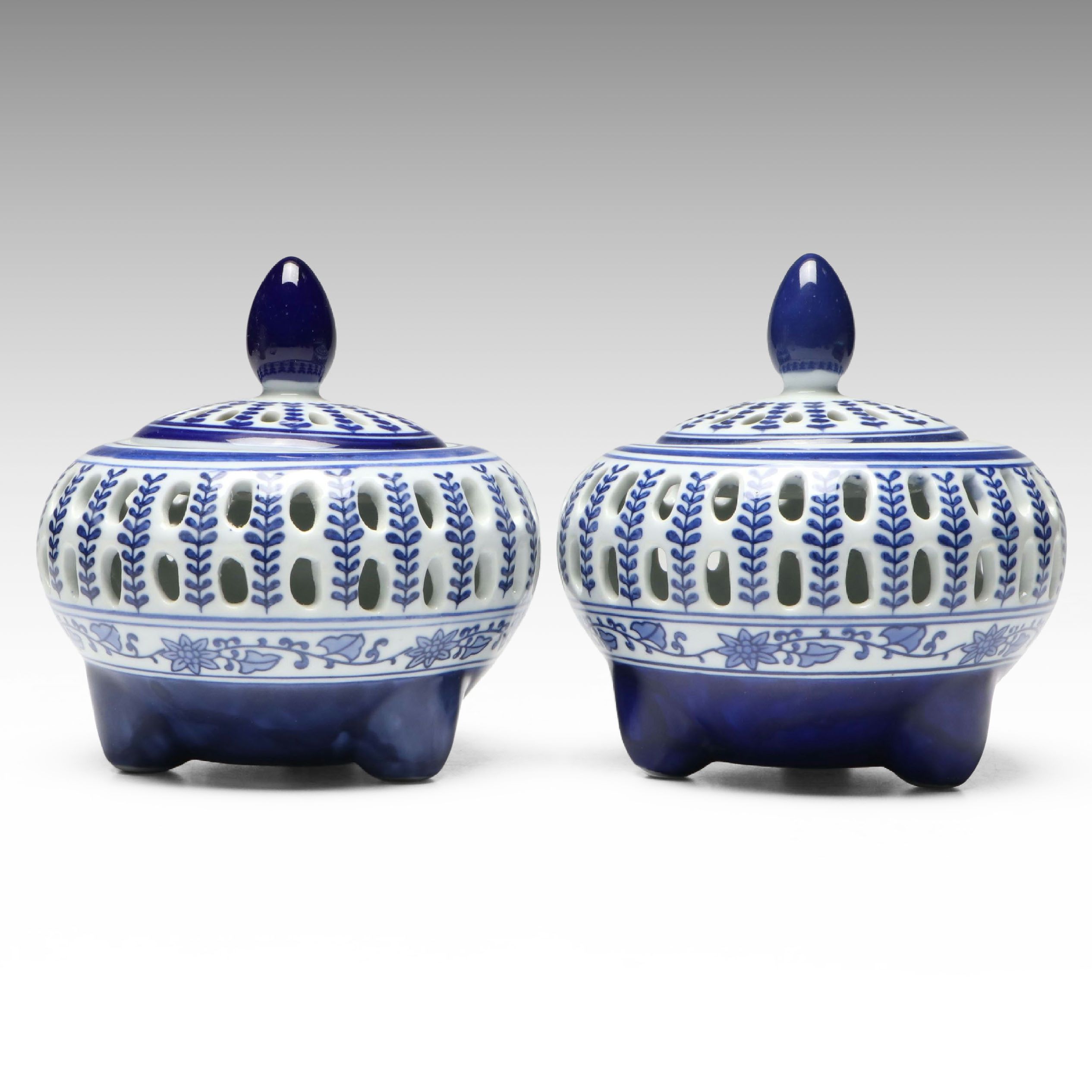 Pair of Bombay Chinese Blue and White Reticulated Porcelain Lidded Vessels