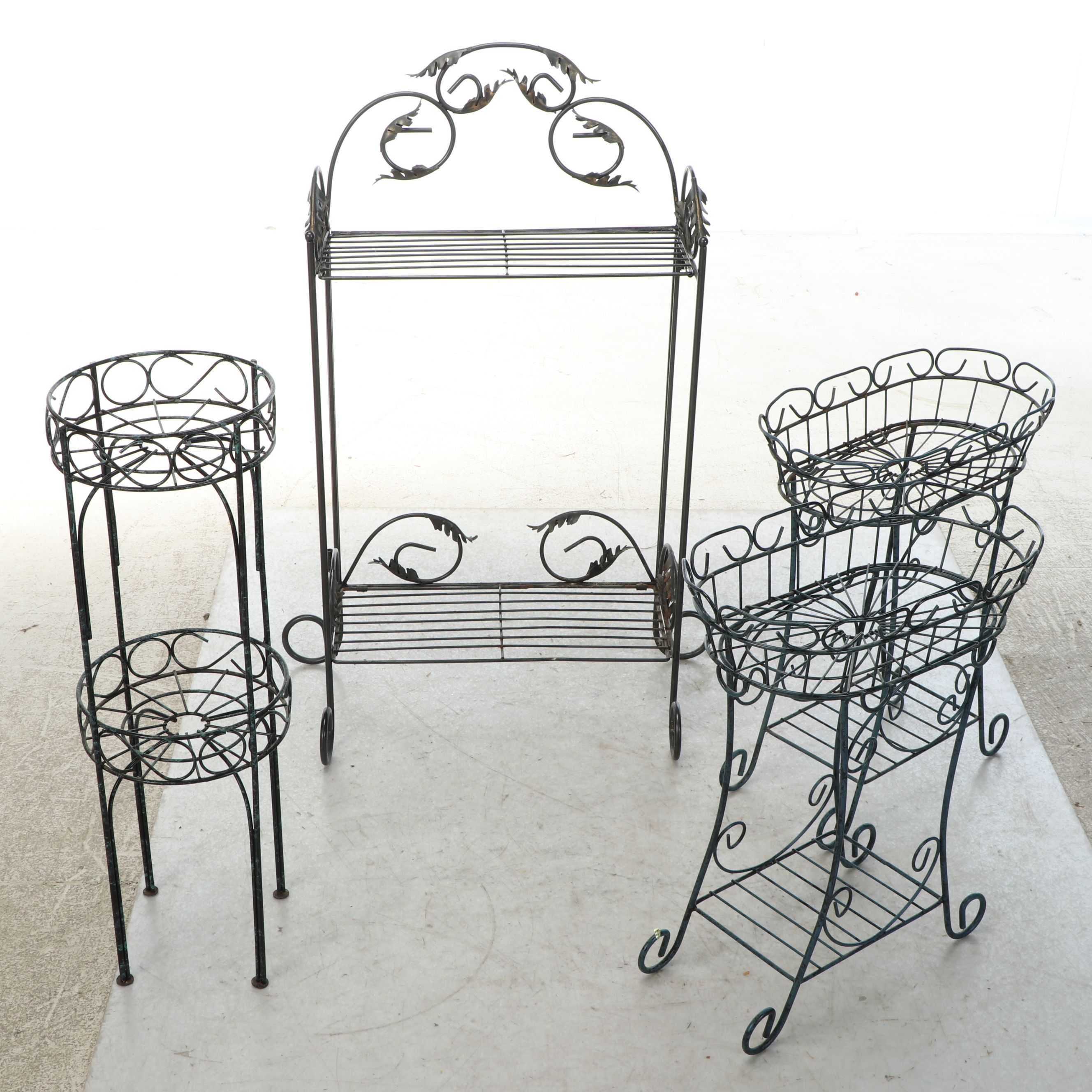 Antiqued Scrollwork Plant Stands with Foliate Decorated Metal Shelf