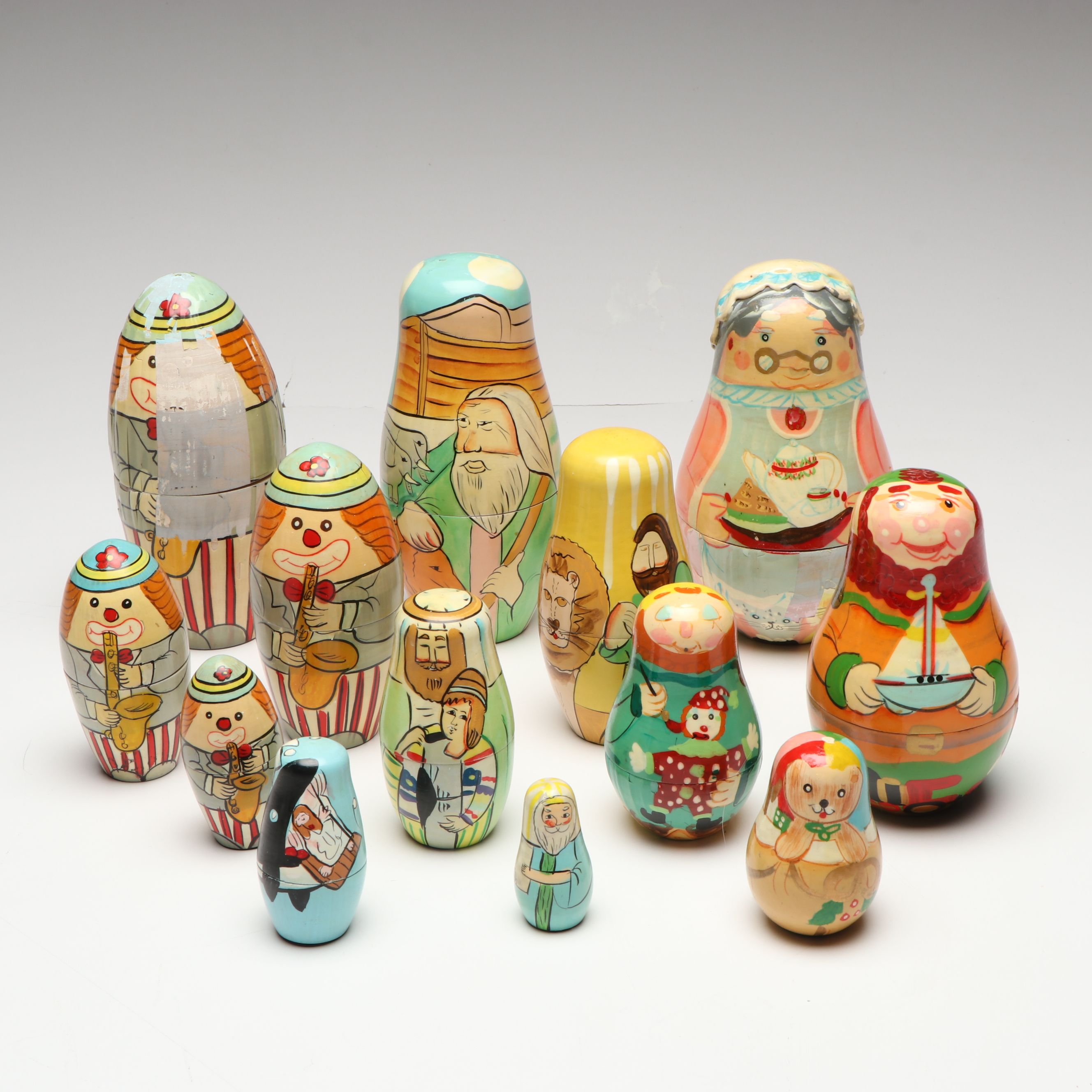 Biblical, Clown and Other Hand-Painted Wooden Nesting Dolls