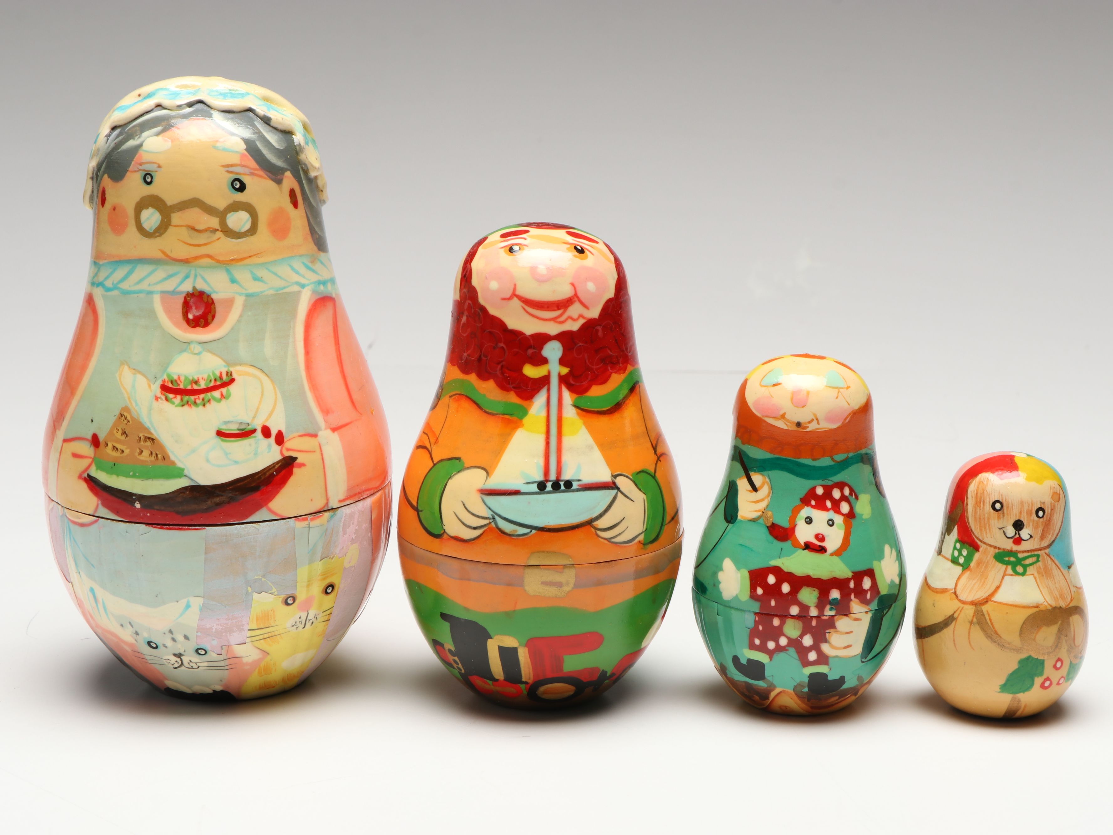Biblical, Clown and Other Hand-Painted Wooden Nesting Dolls