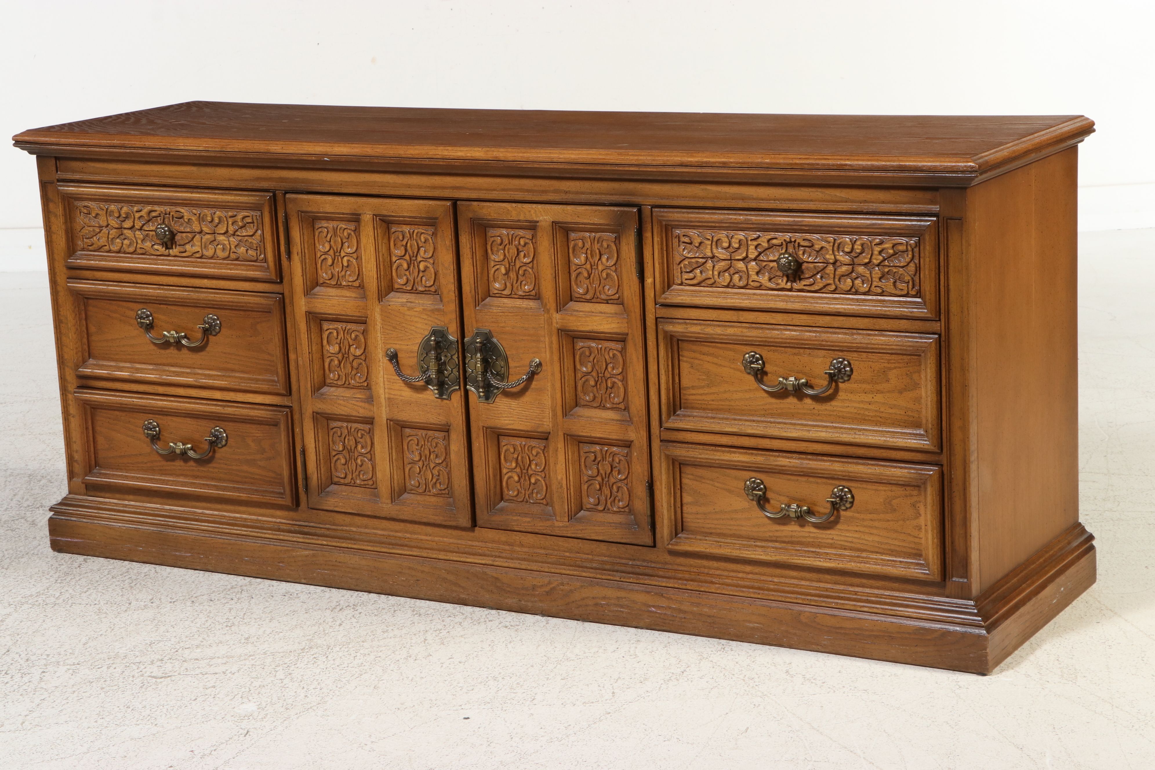 United Furniture Spanish Revival Style Carved Oak Triple Dresser with Mirrors