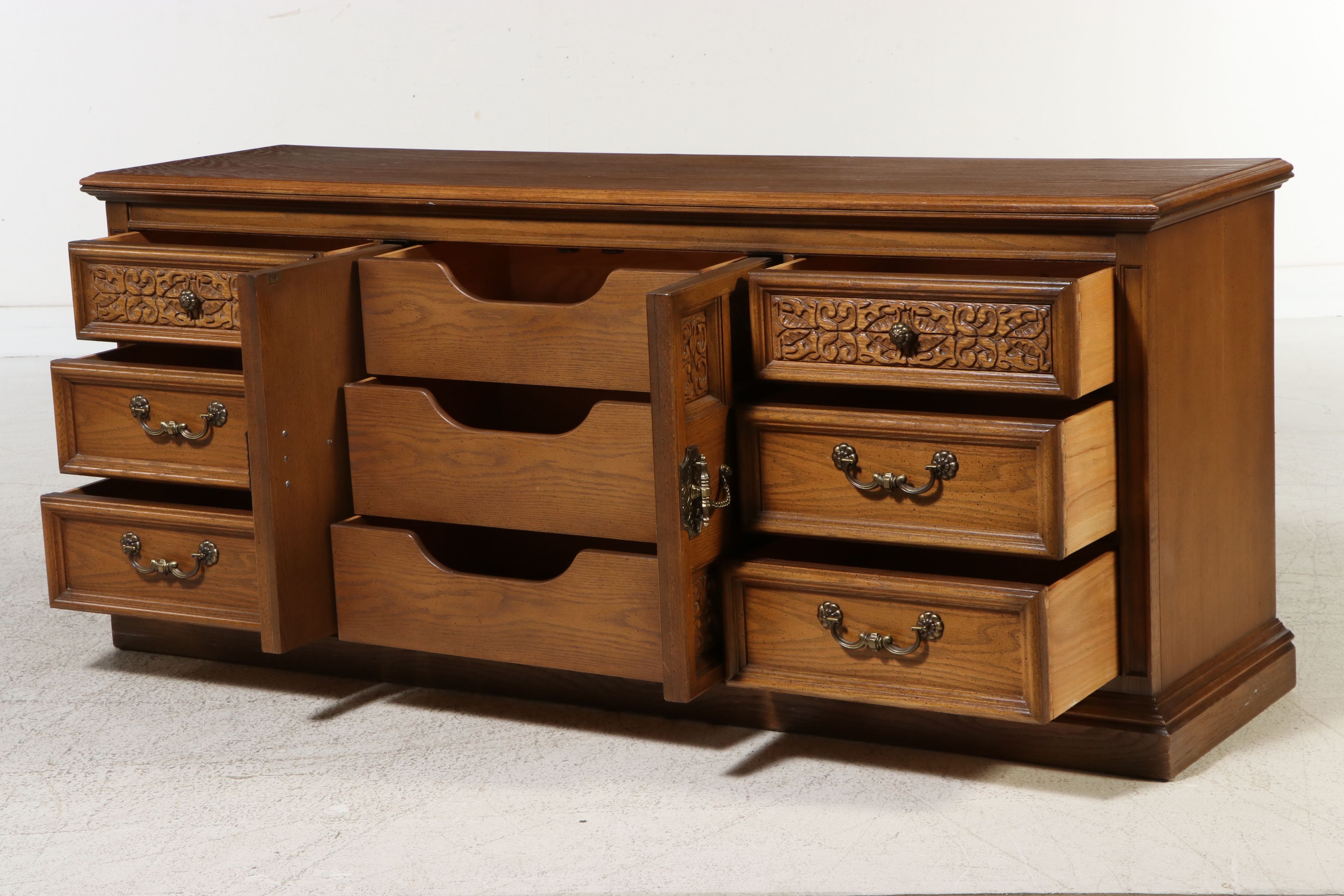 United Furniture Spanish Revival Style Carved Oak Triple Dresser with Mirrors