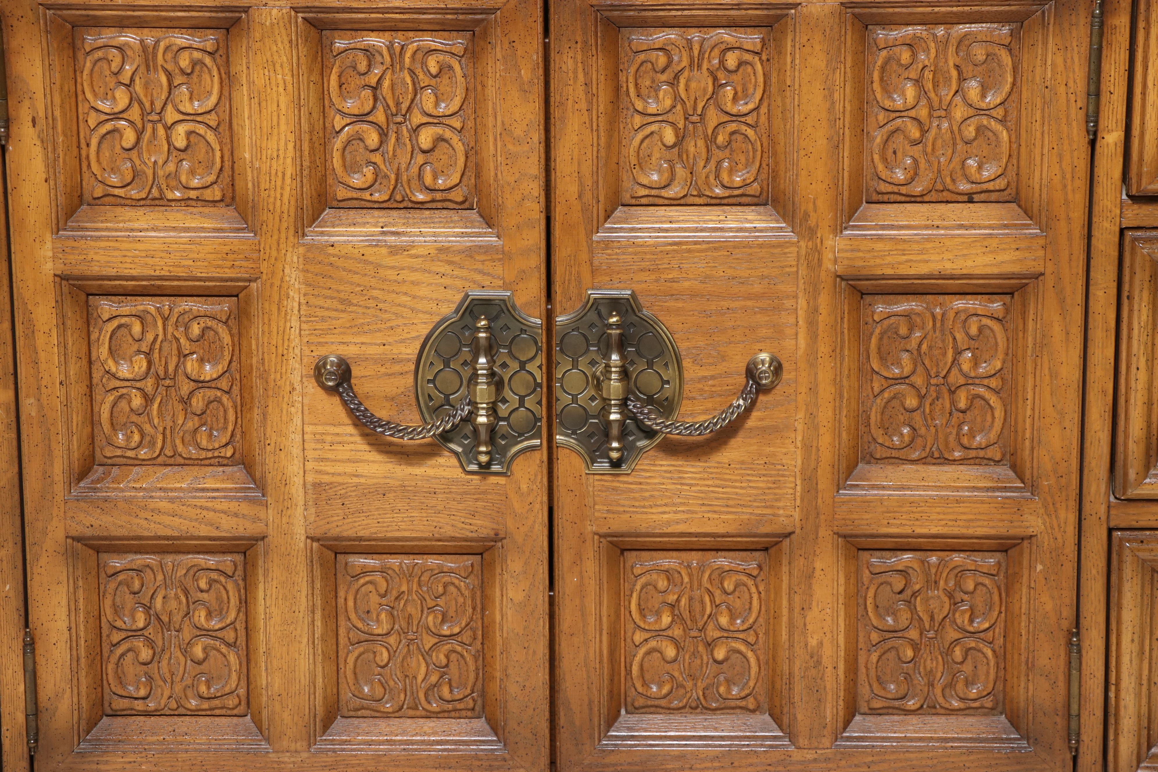 United Furniture Spanish Revival Style Carved Oak Triple Dresser with Mirrors