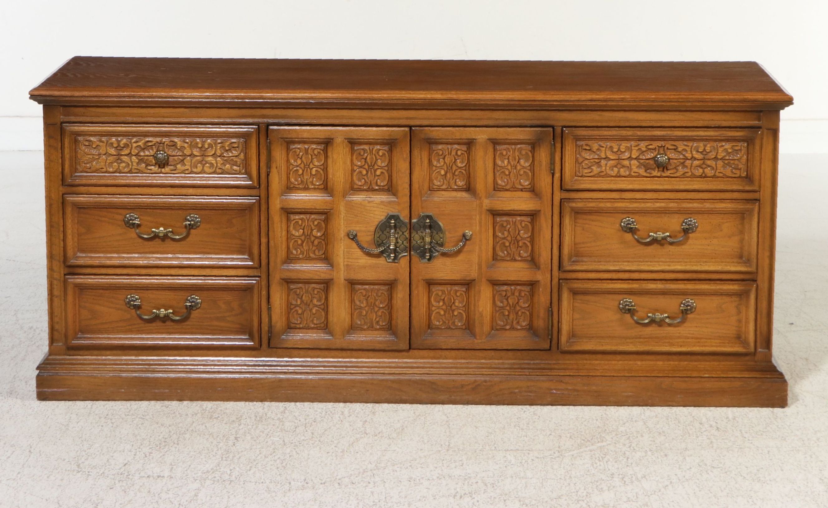 United Furniture Spanish Revival Style Carved Oak Triple Dresser with Mirrors
