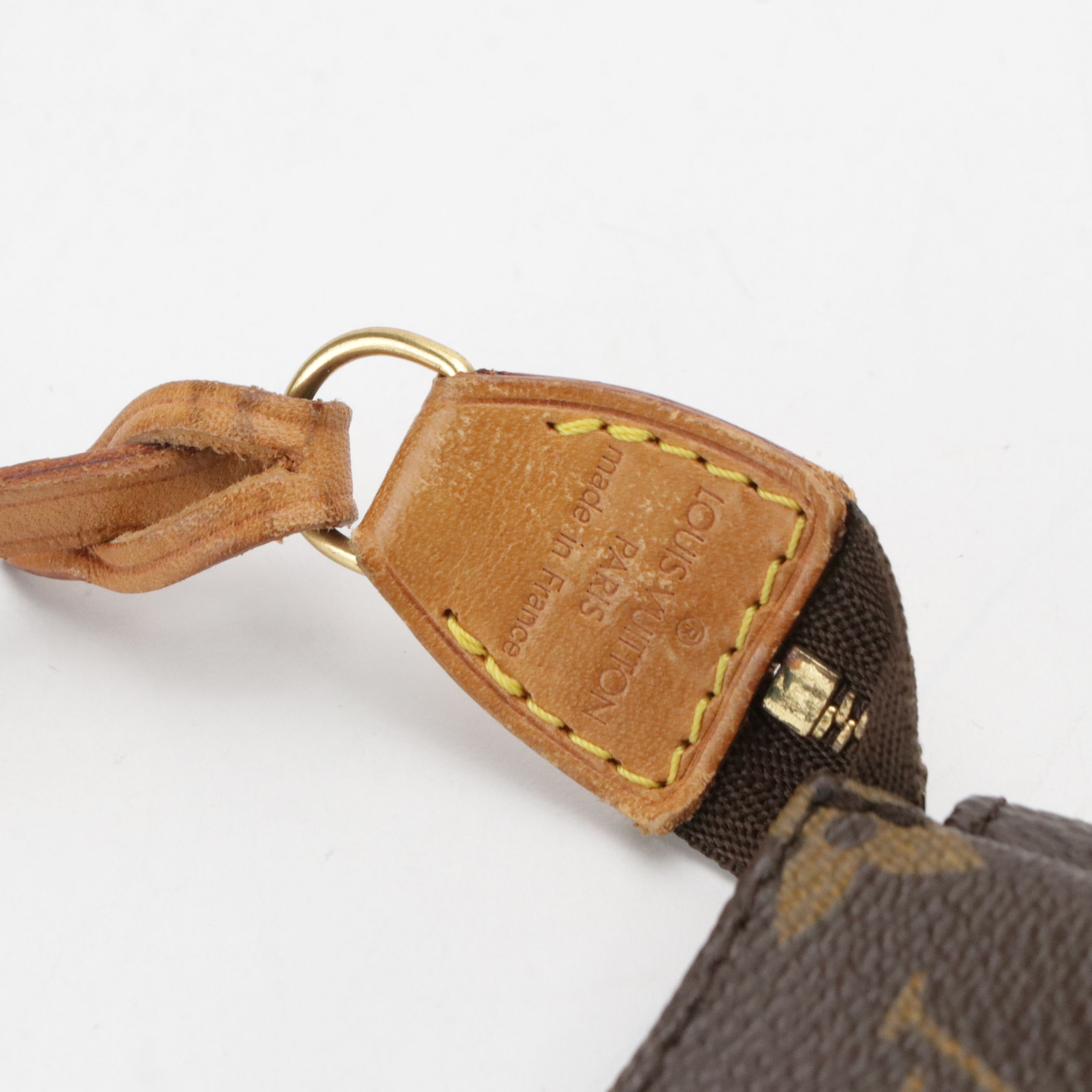 Louis Vuitton Pochette Accessoires in Monogram Canvas and Vachetta Leather