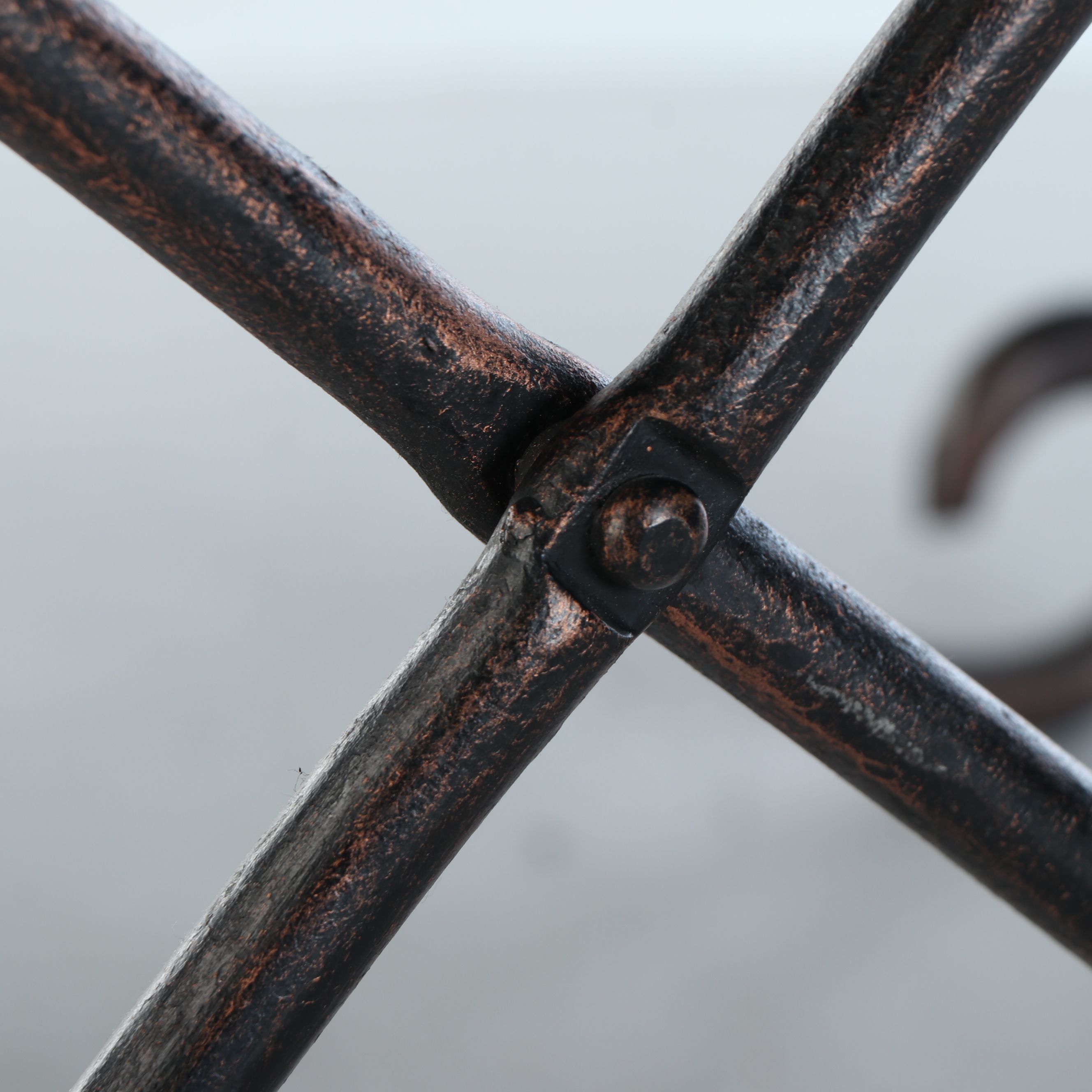 Rustic Padded Leather Footstools with Scrolled Folding Metal Frames