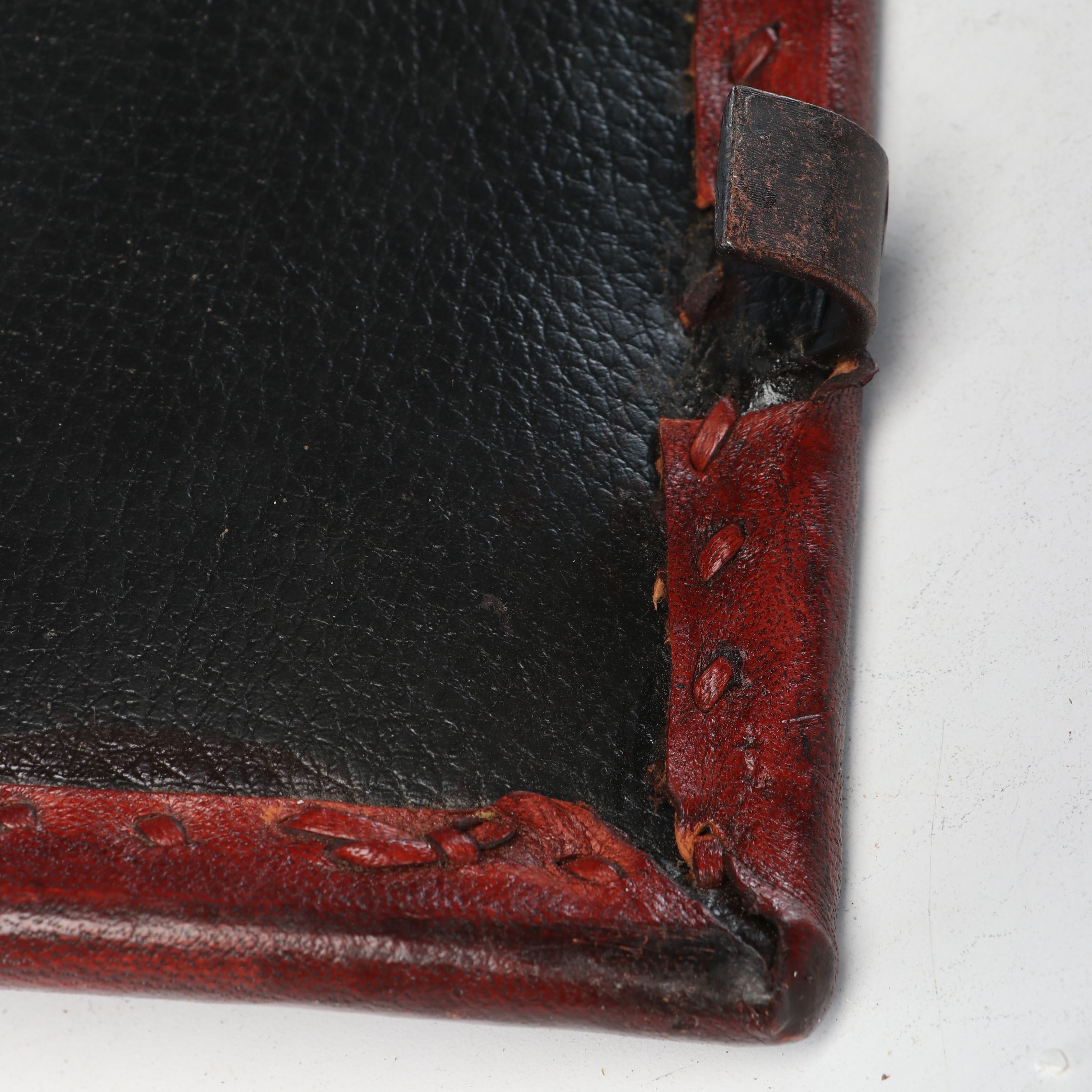 Rustic Padded Leather Footstools with Scrolled Folding Metal Frames