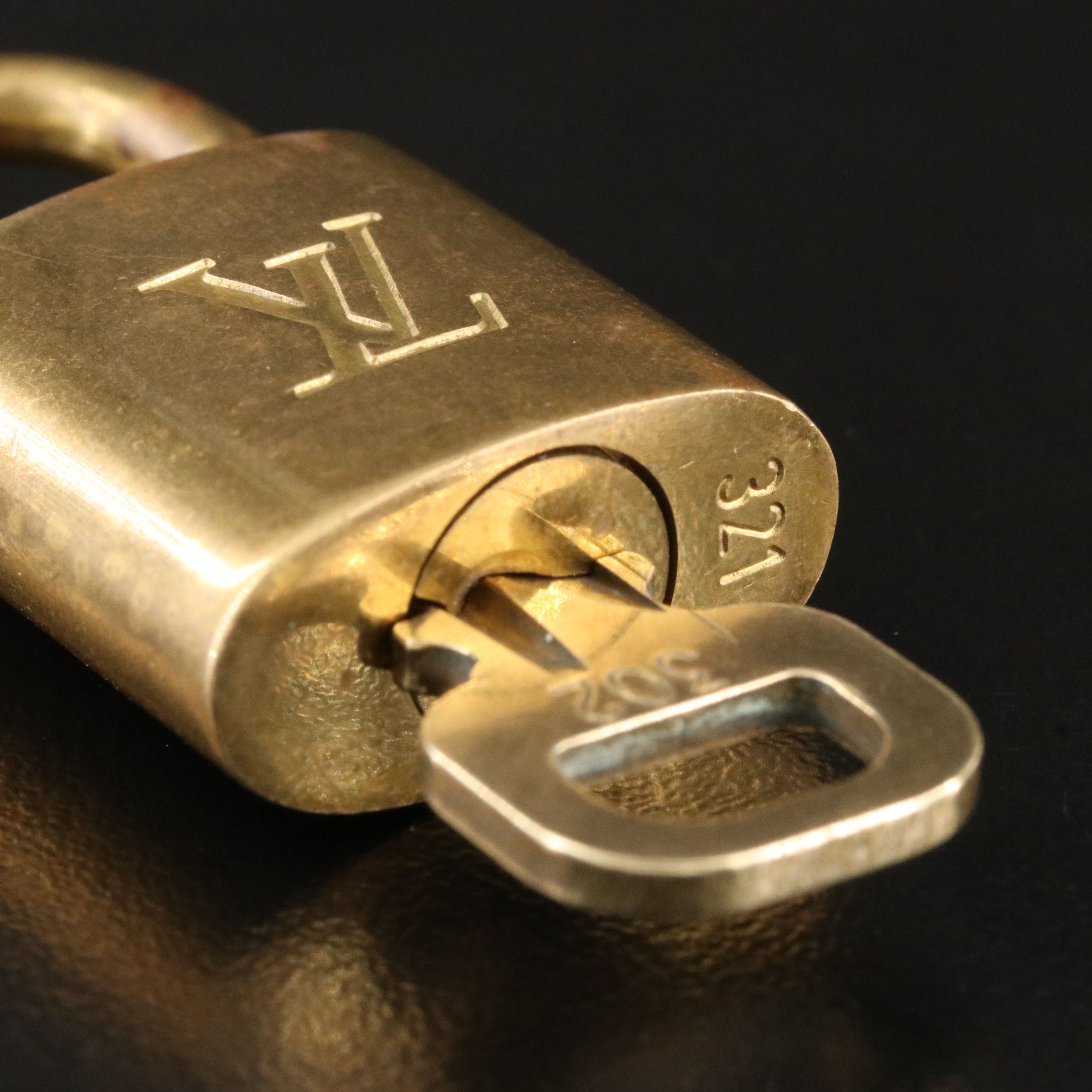 Louis Vuitton Brass Luggage Padlock and Key