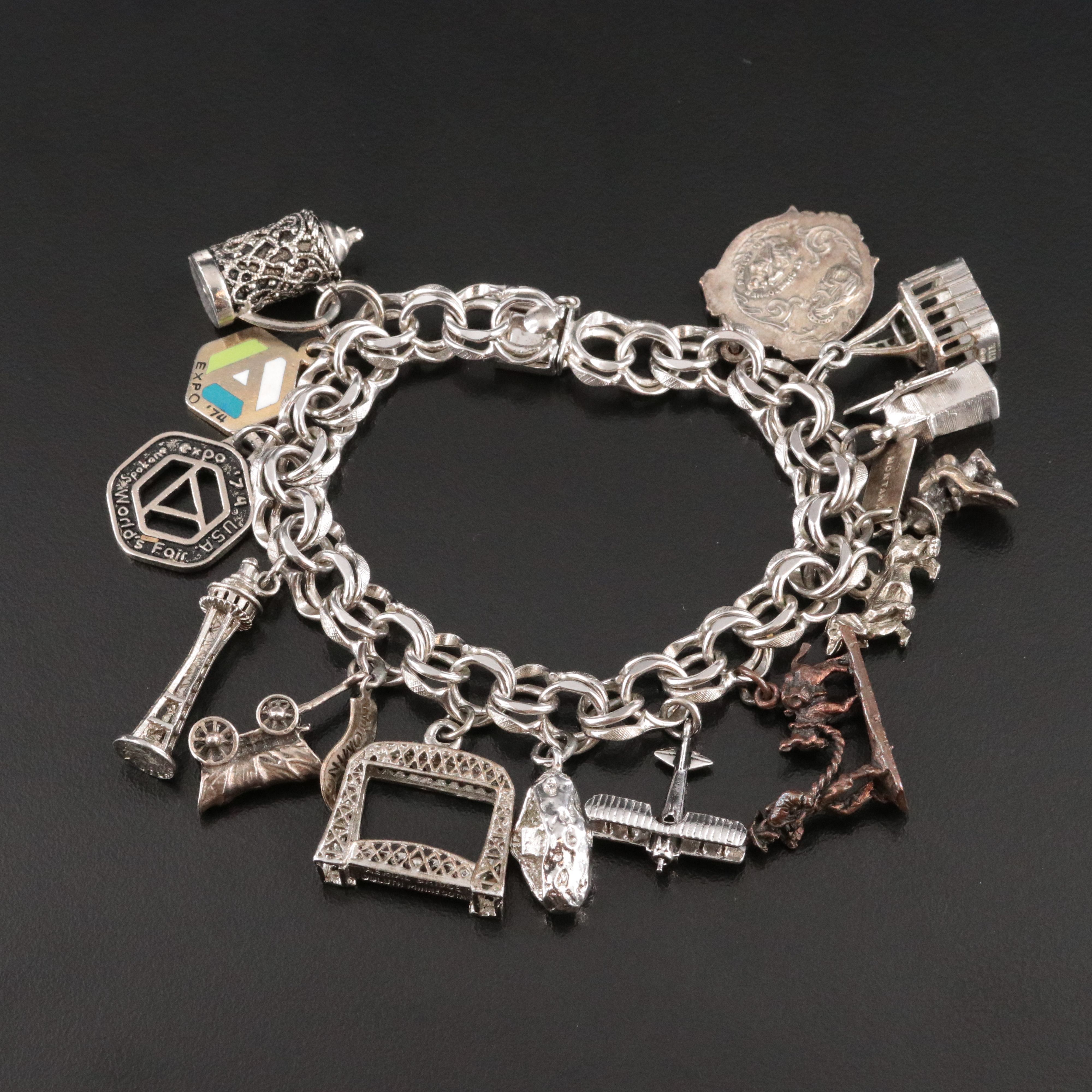 Vintage Sterling Charm Bracelet Featuring Commemorative and Travel Charms