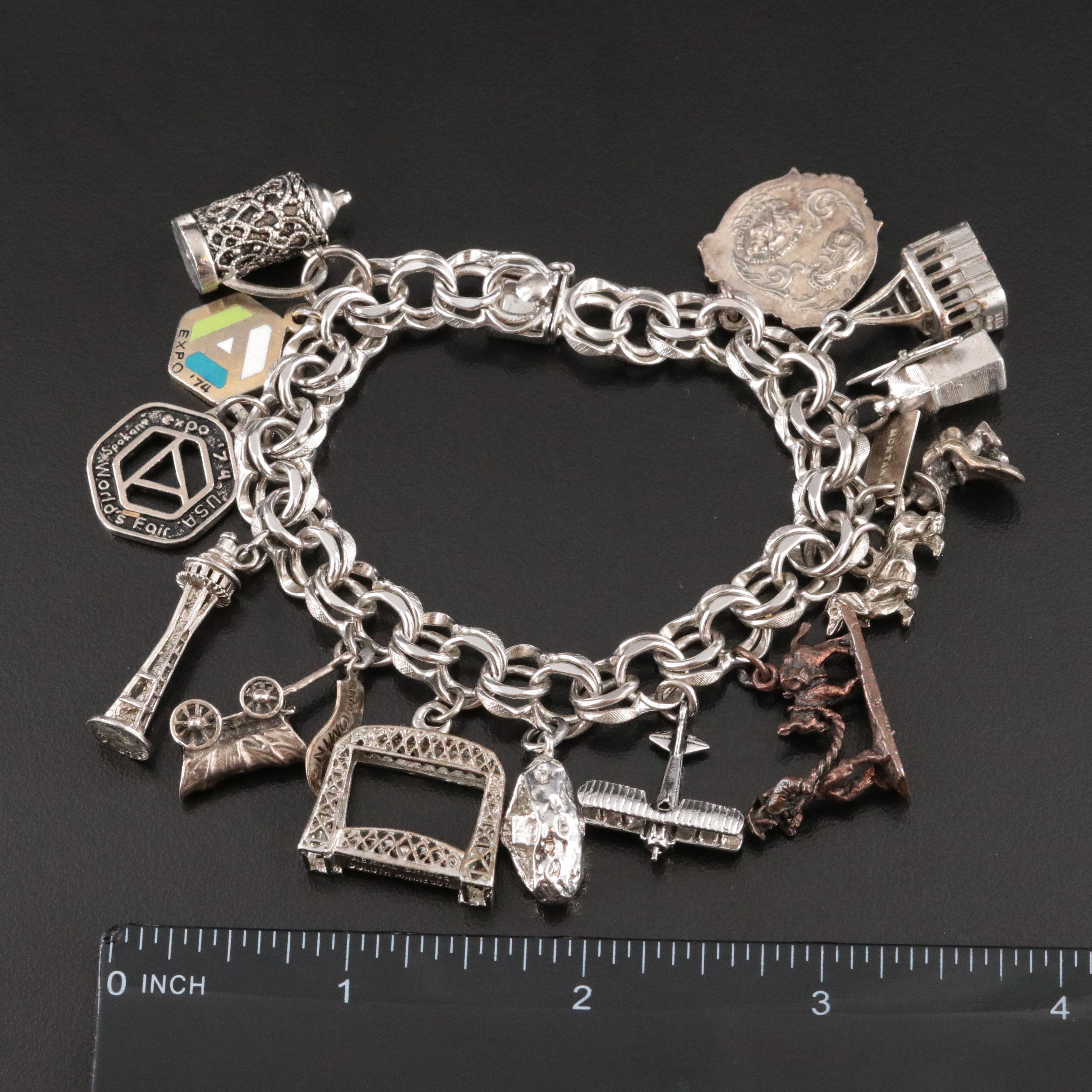 Vintage Sterling Charm Bracelet Featuring Commemorative and Travel Charms