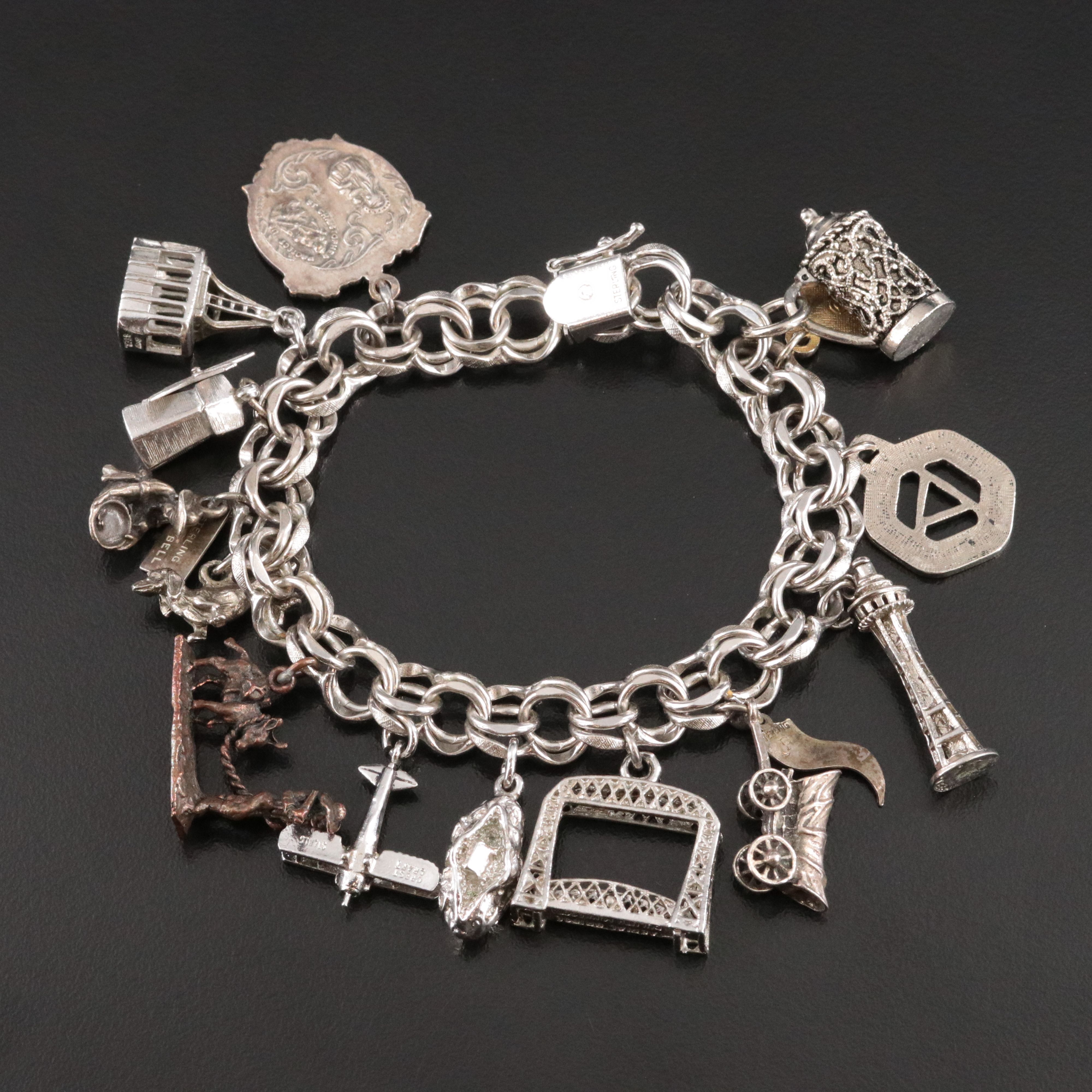Vintage Sterling Charm Bracelet Featuring Commemorative and Travel Charms