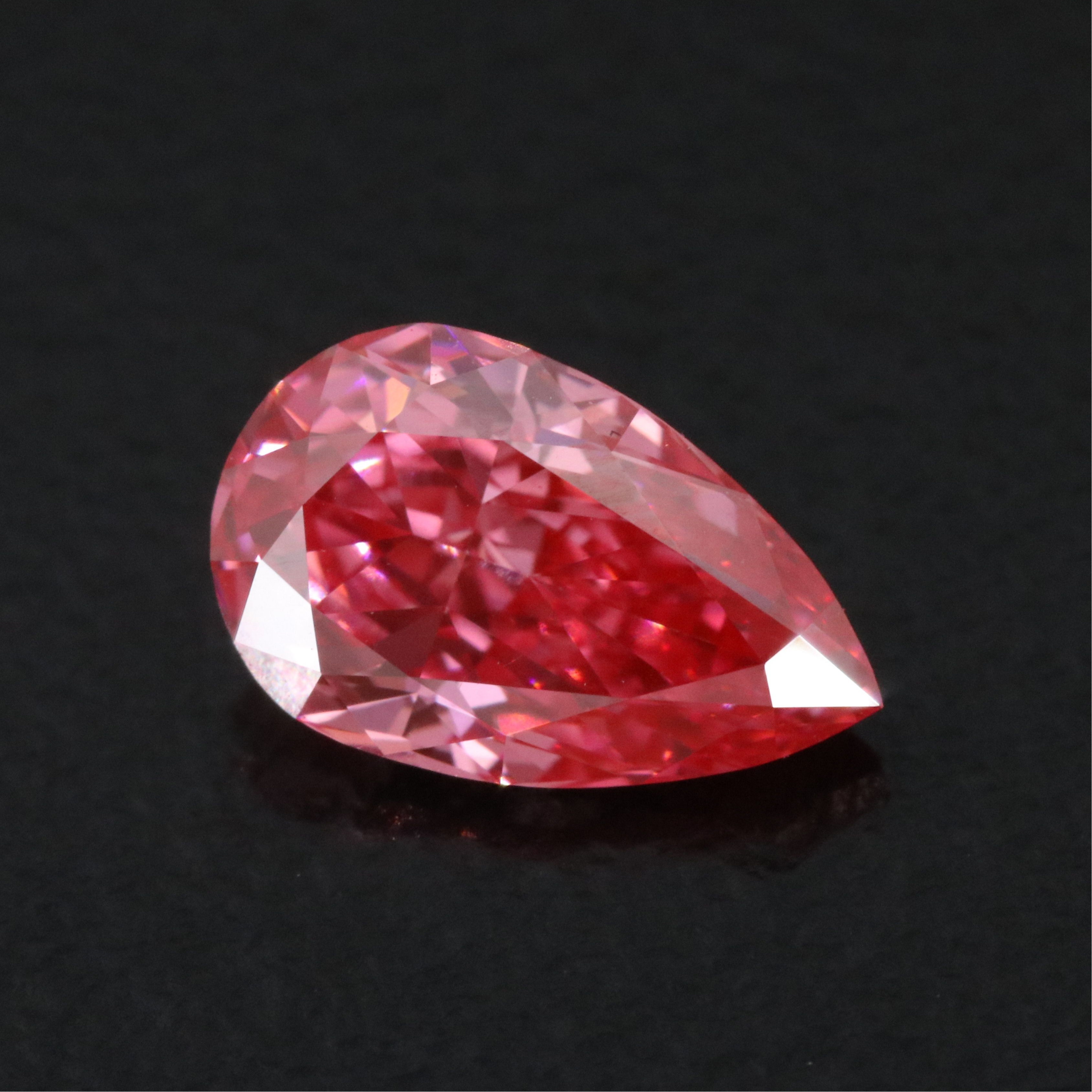 Loose 1.04 CT Fancy Vivid Pink Lab Grown Diamond with IGI Report