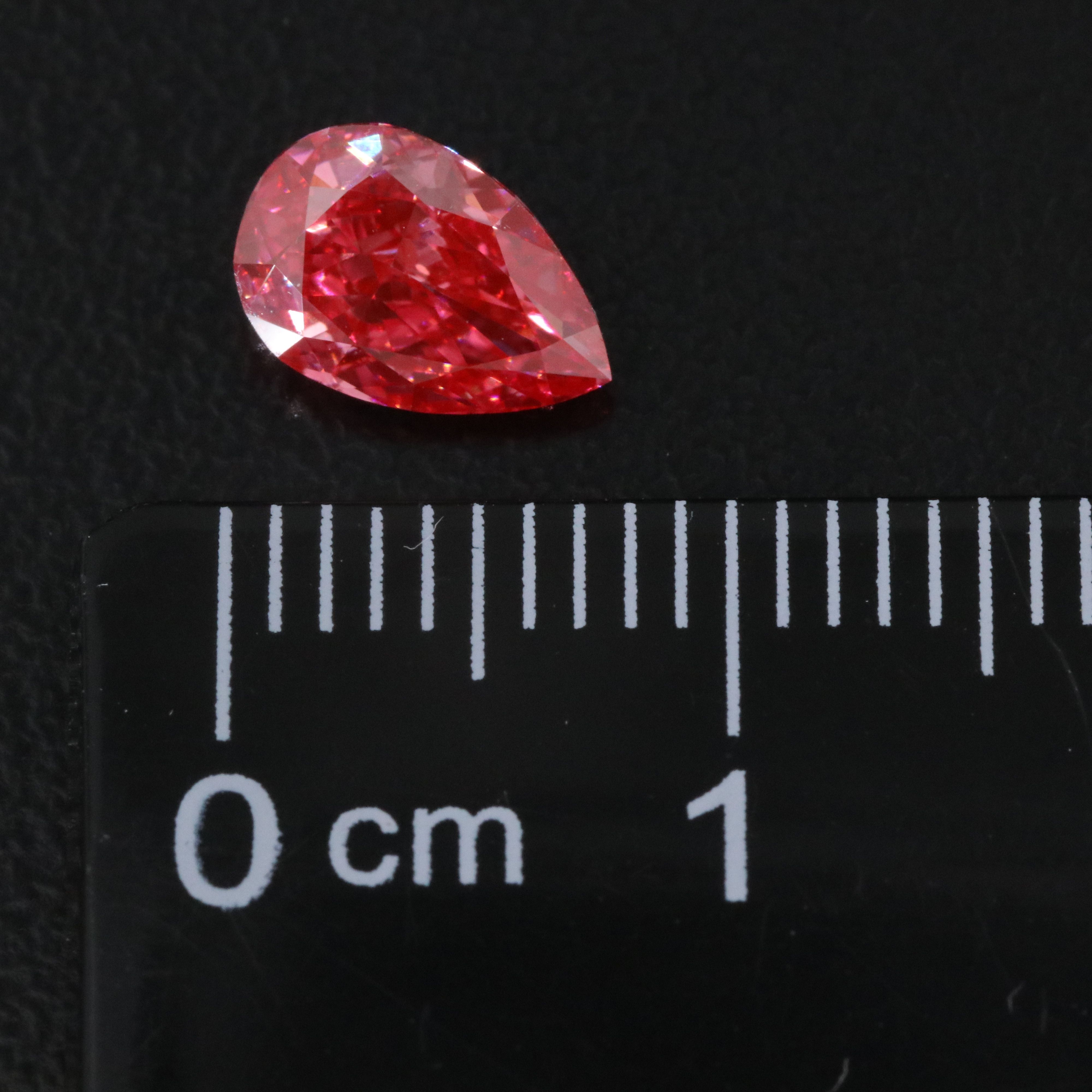 Loose 1.03 CT Fancy Vivid Pink Lab Grown Diamond with IGI Report