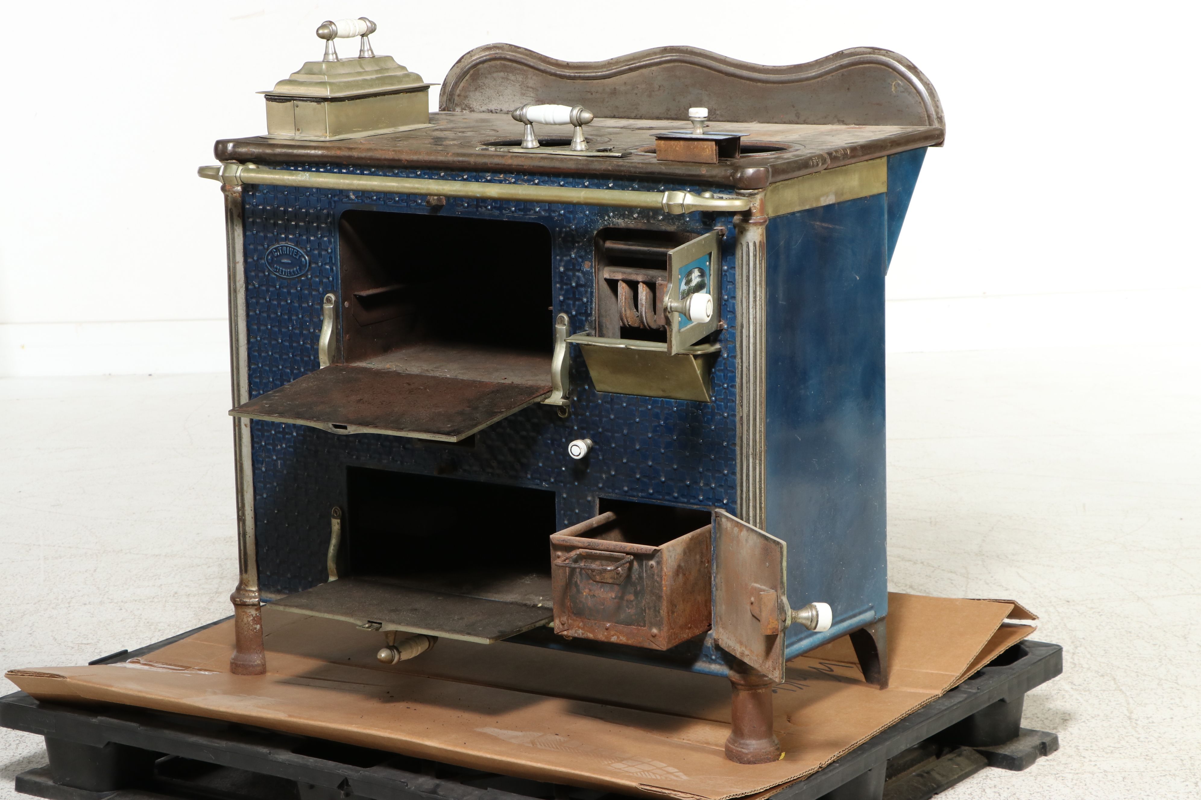 Ornate Enameled Cast Iron and Brass Cookstove, Late 19th Century
