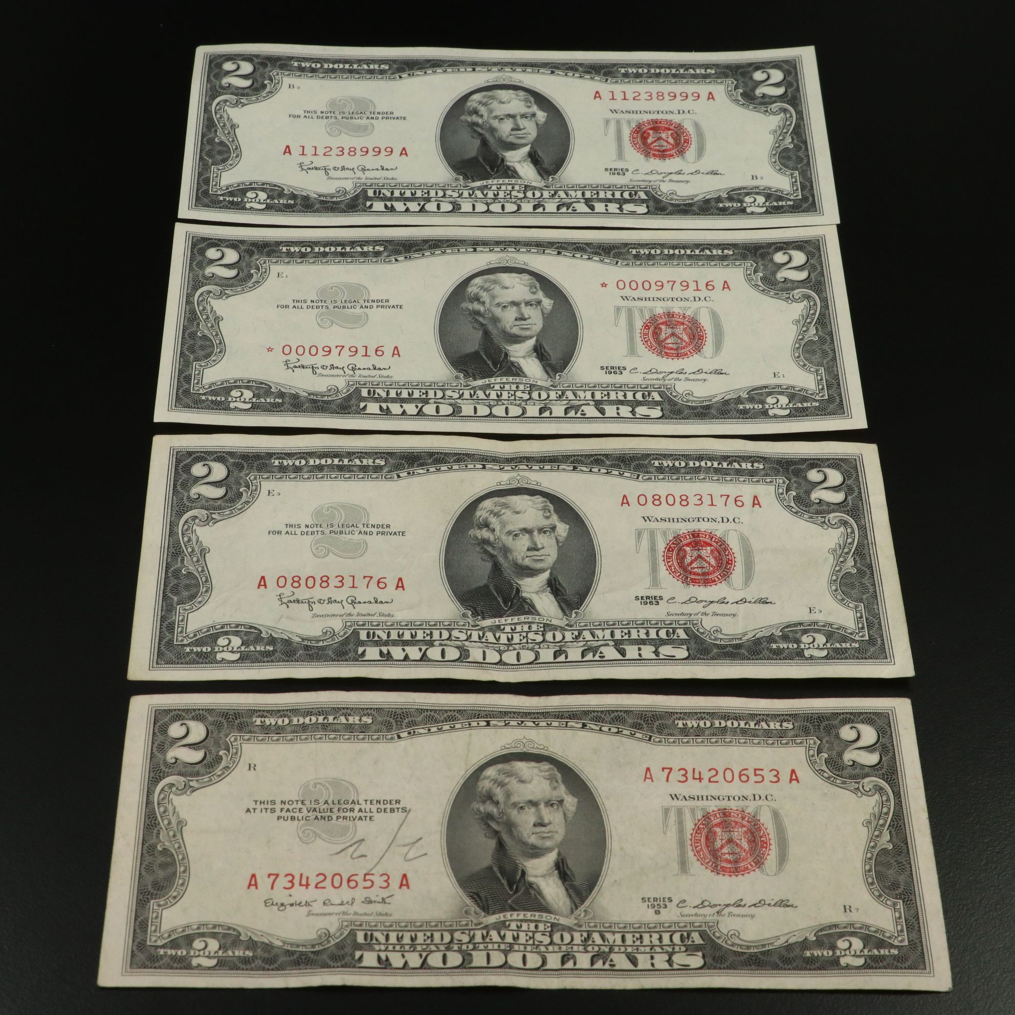 Fifty-Nine U.S. Banknotes, $2 United States Notes and $1 Silver Certificates