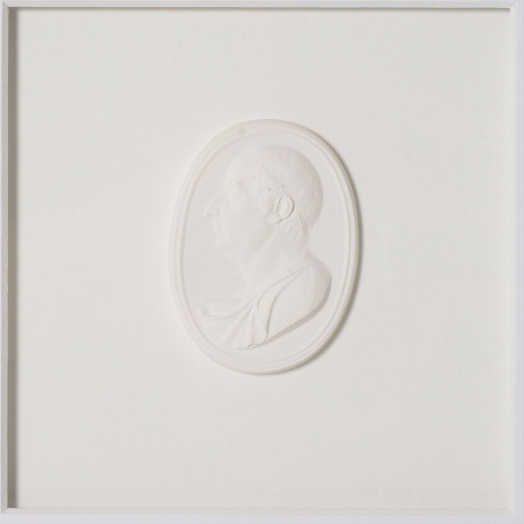 Italian Neoclassical Style Plaster Bas-Relief Intaglios Featuring Male Portraits