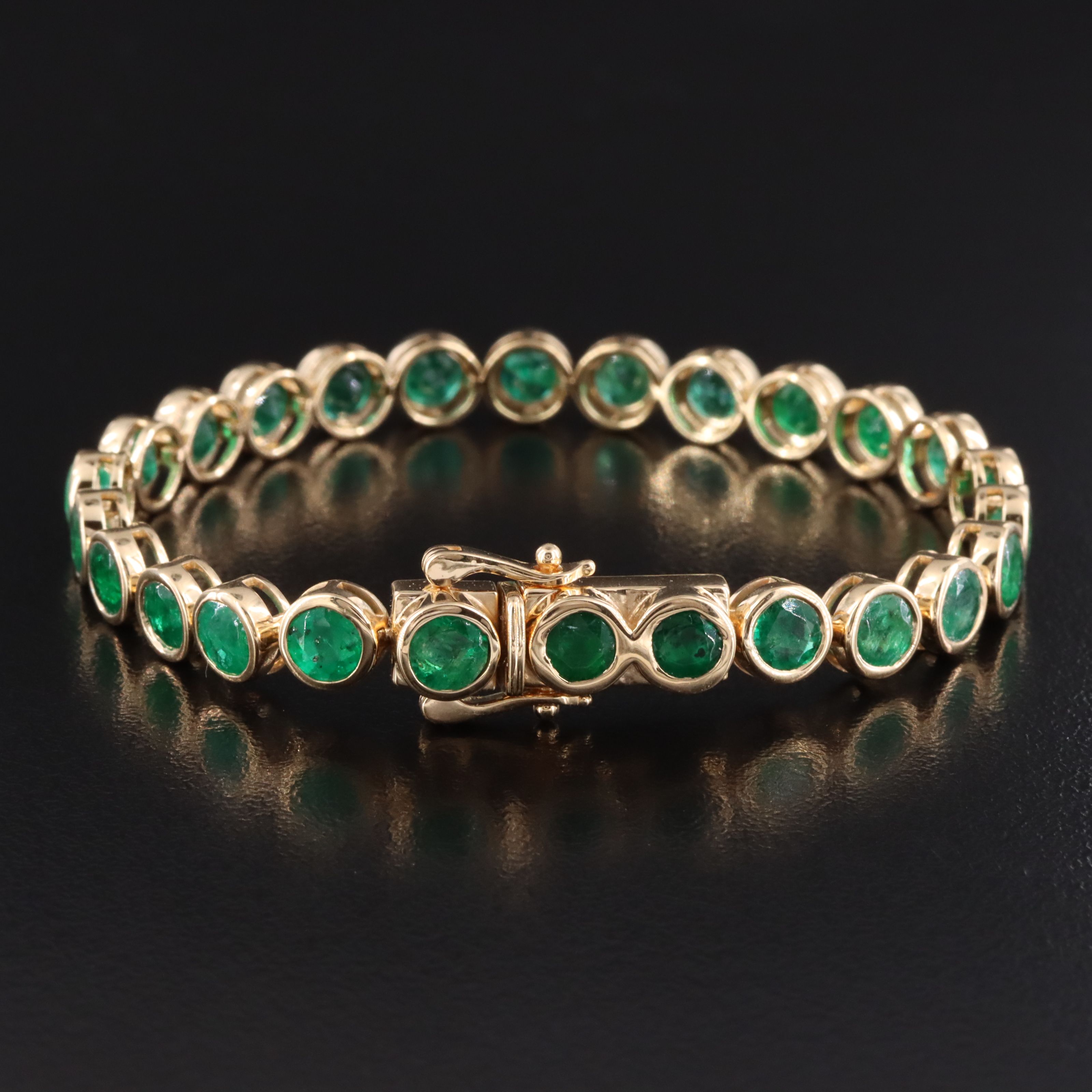 18K 10.03 CTW Emerald Line Bracelet