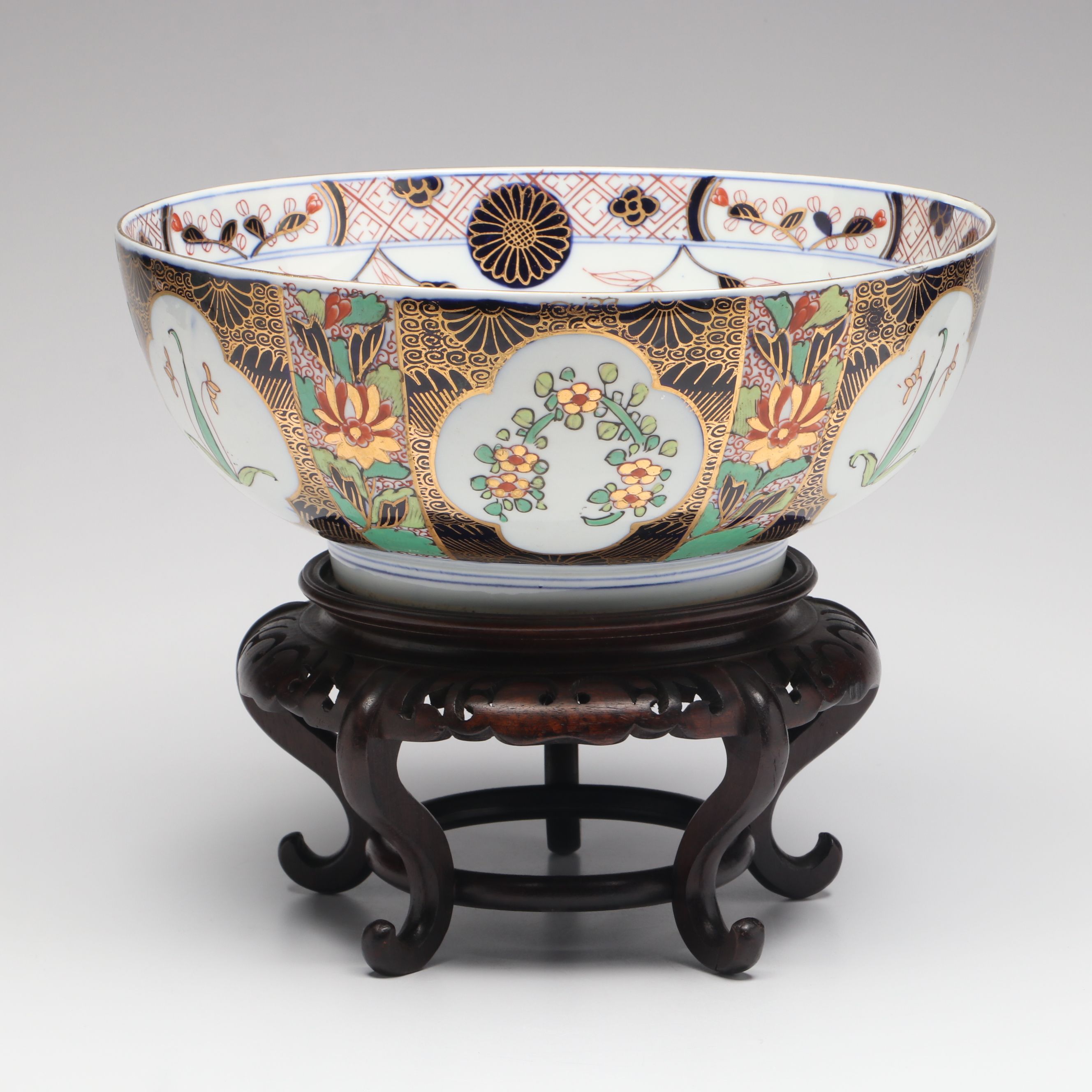 Gilt Decorated Porcelain Decorative Bowl with Carved Wood Stand