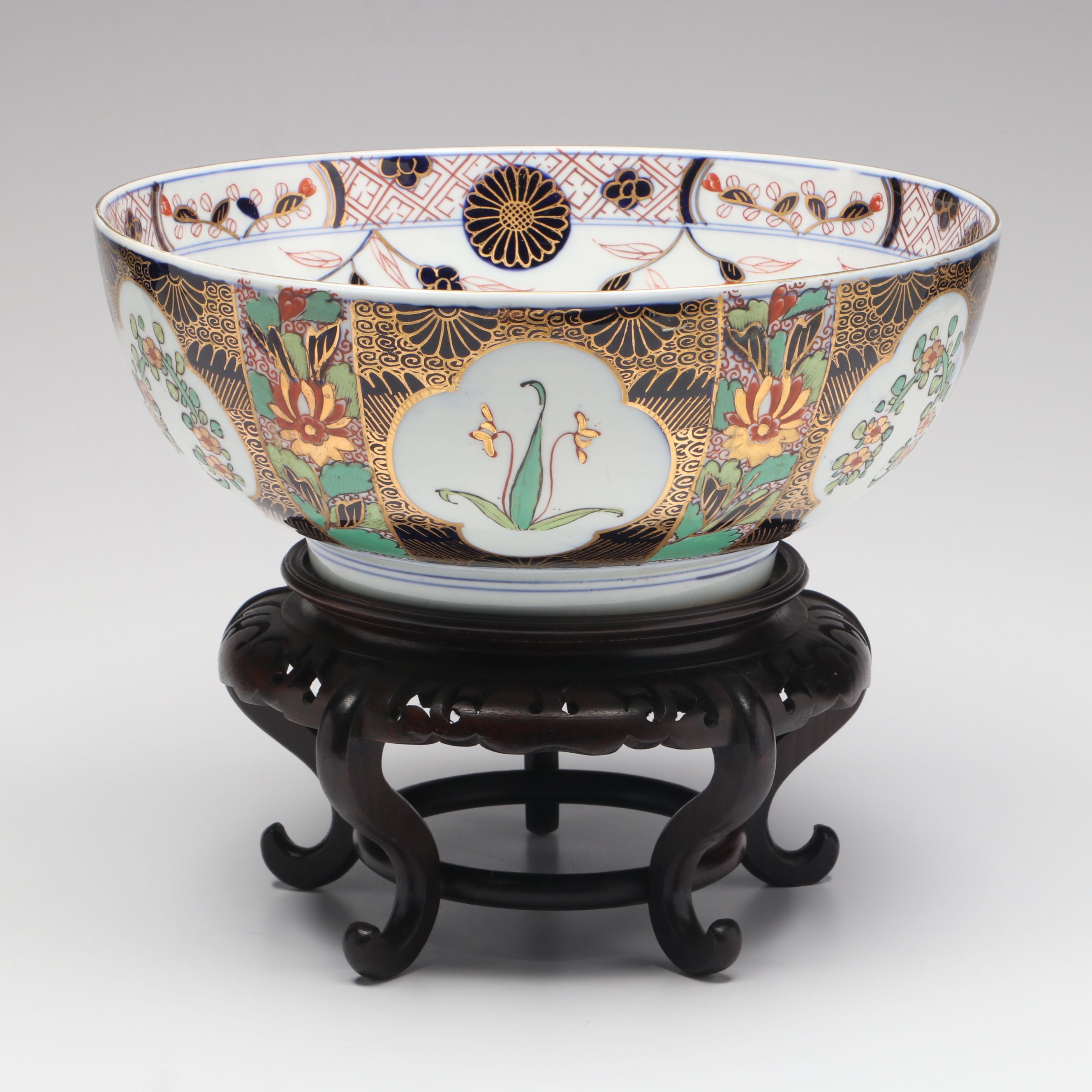 Gilt Decorated Porcelain Decorative Bowl with Carved Wood Stand