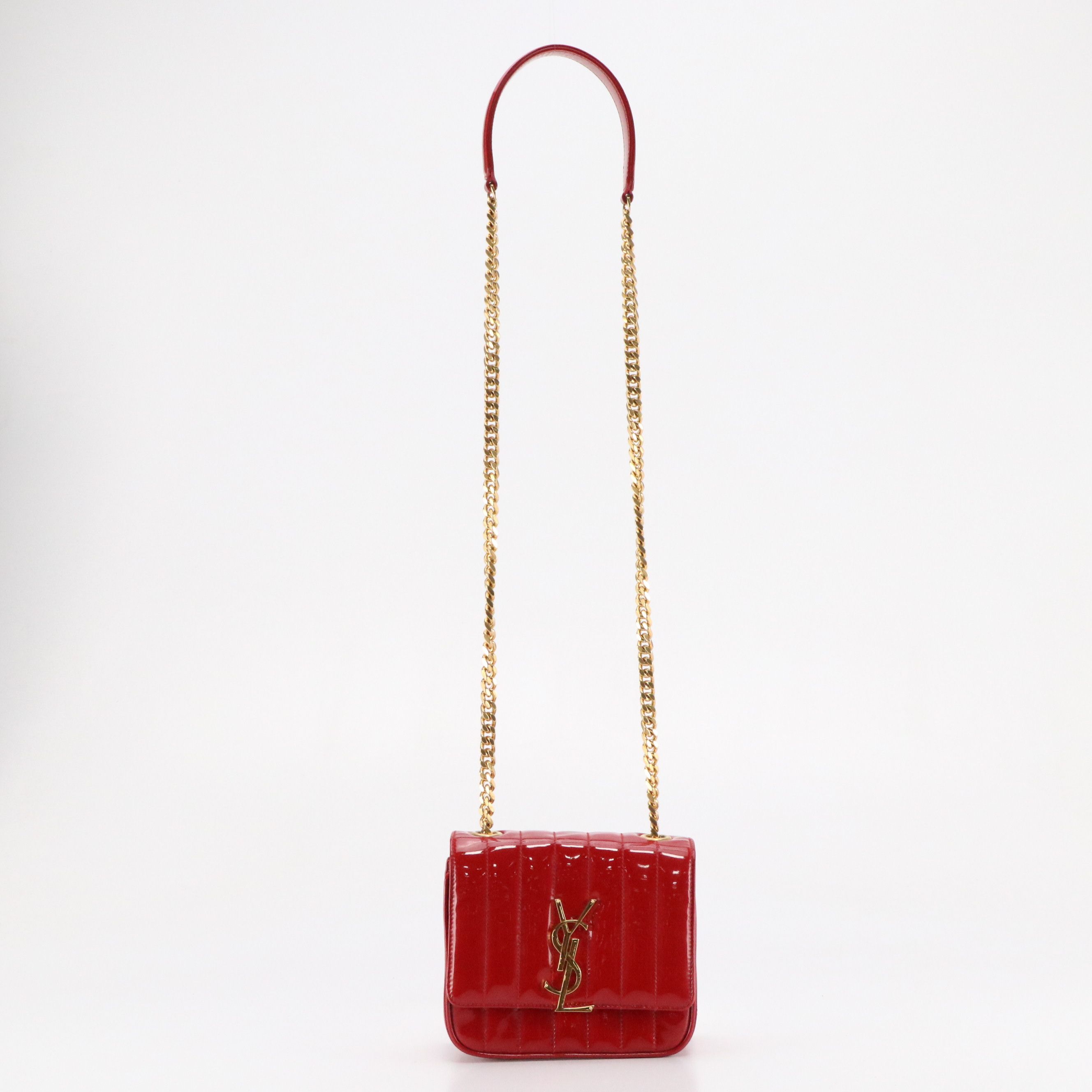 ARIES: Saint Laurent Vicky Crossbody Bag in Red Vertical Quilted Patent Leather