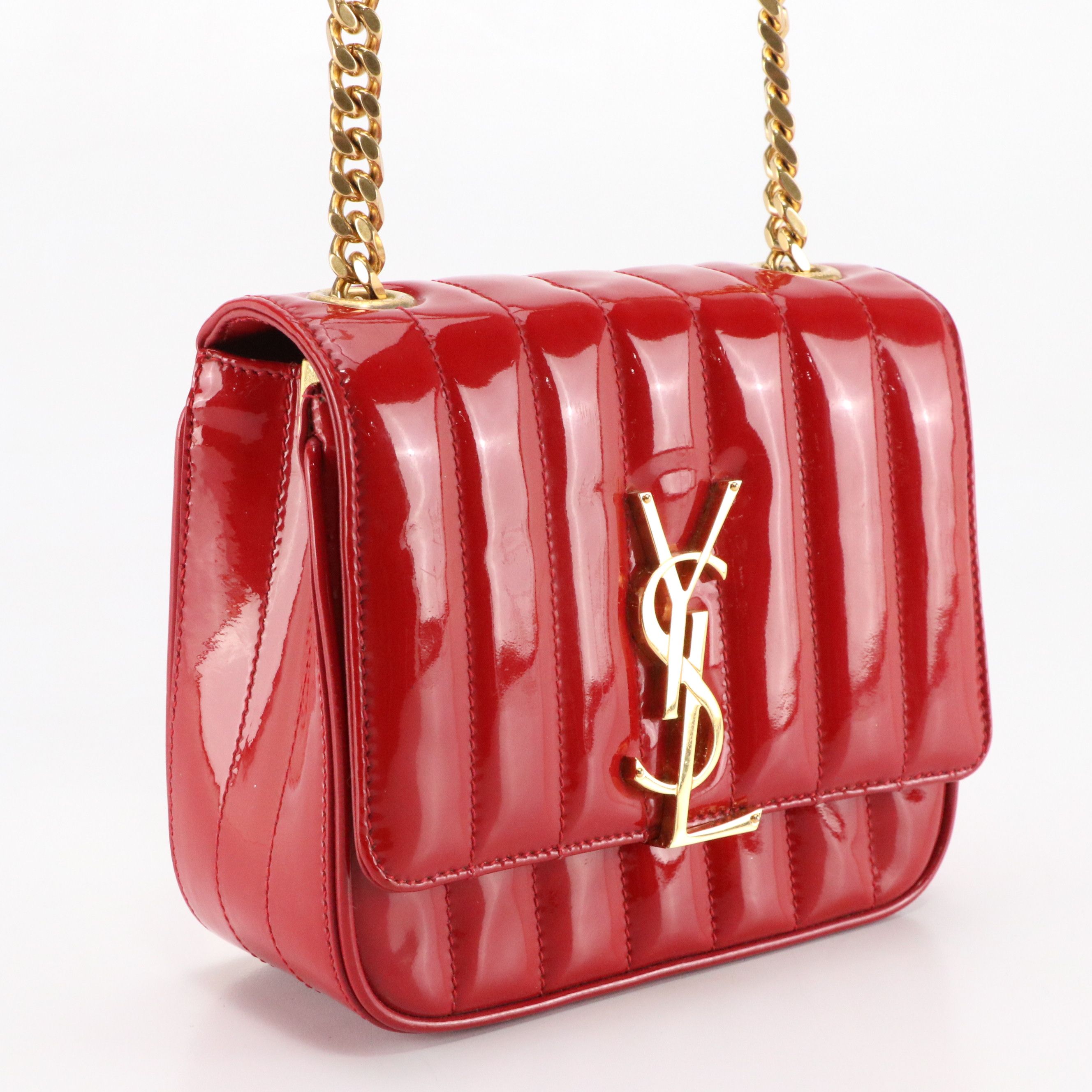 ARIES: Saint Laurent Vicky Crossbody Bag in Red Vertical Quilted Patent Leather
