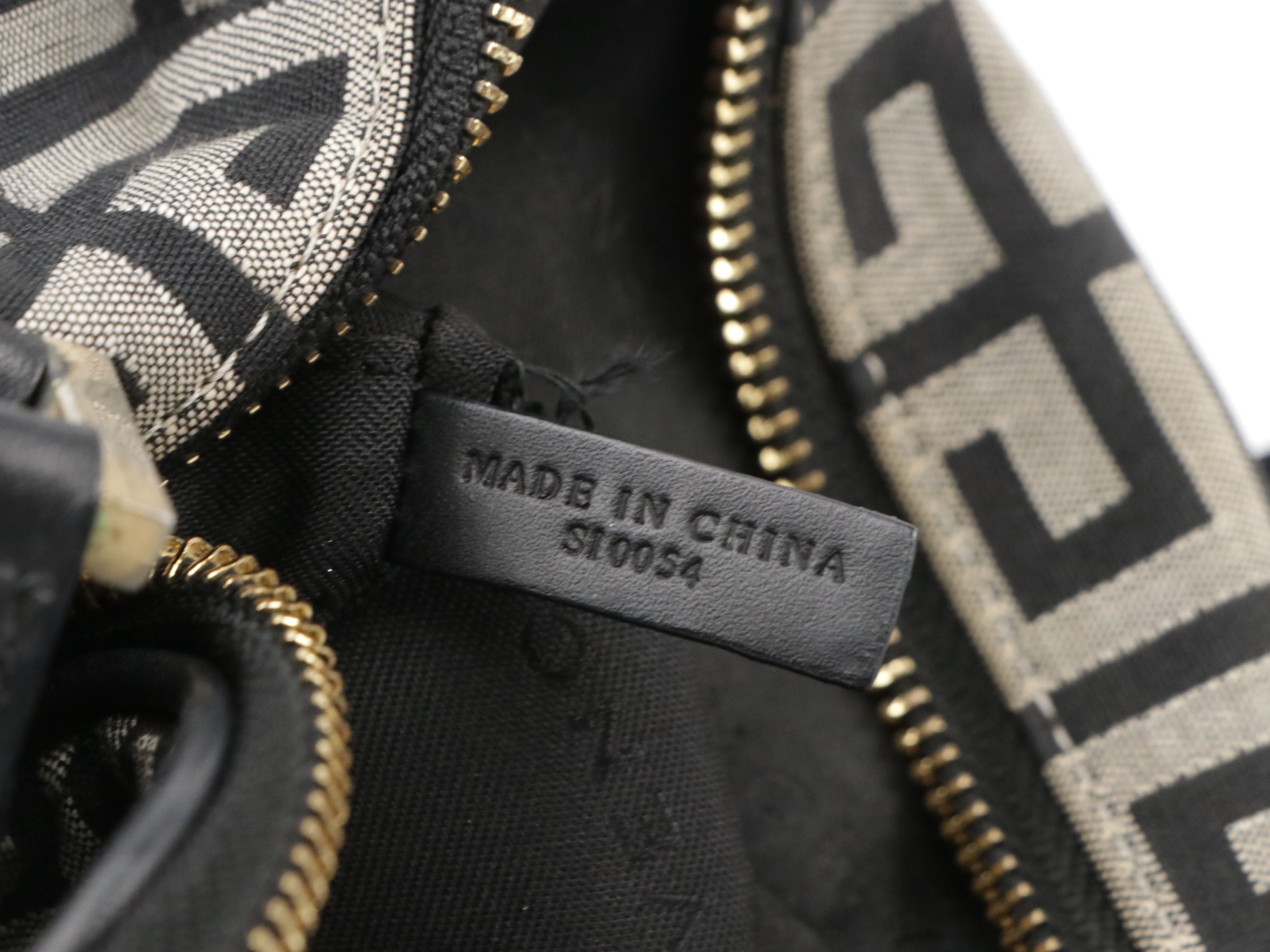 Givenchy Monogram Canvas and Leather Tassel Bag
