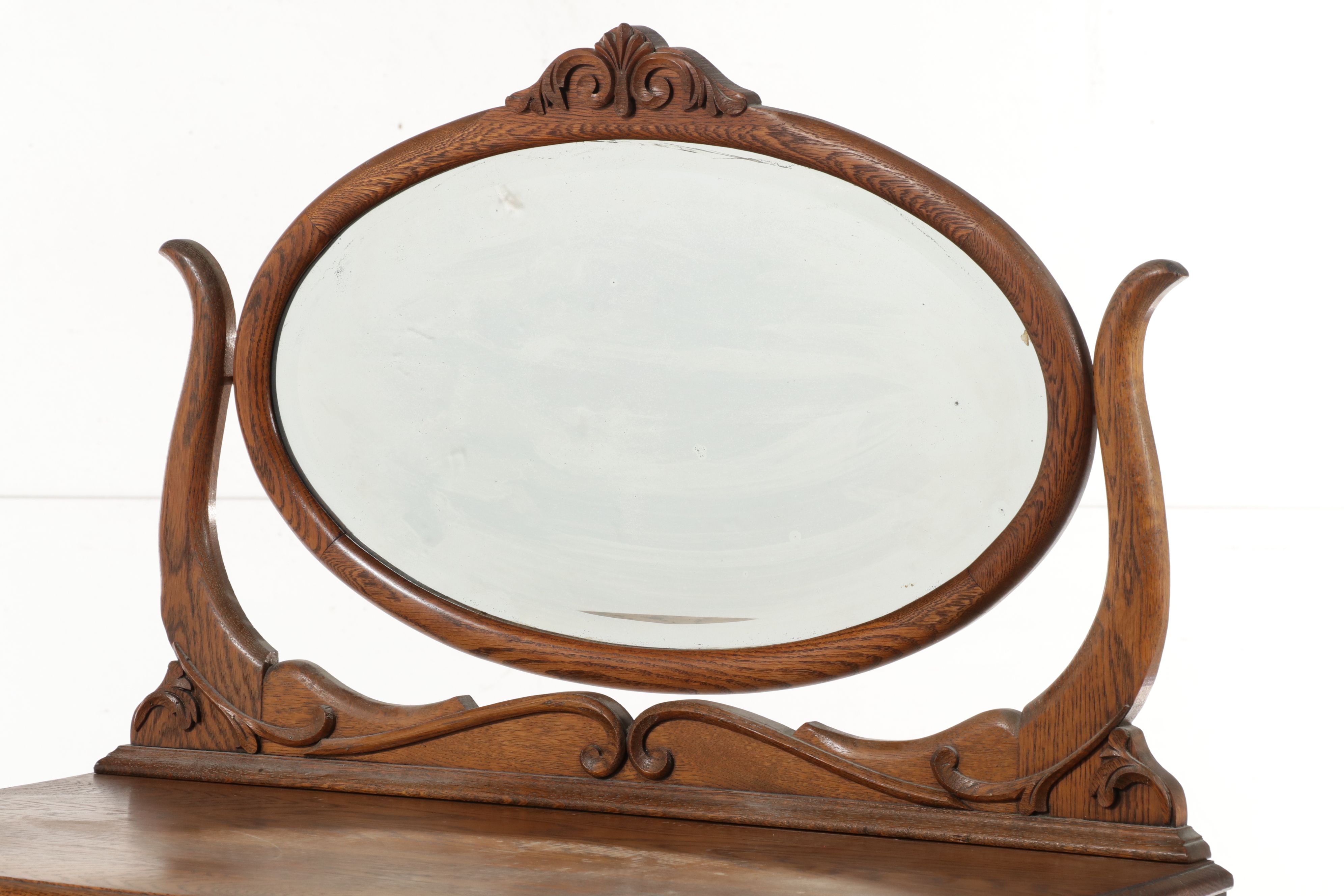 Edwardian Carved Tiger Oak Highboy Dresser with Swivel Mirror, Early 20th C.