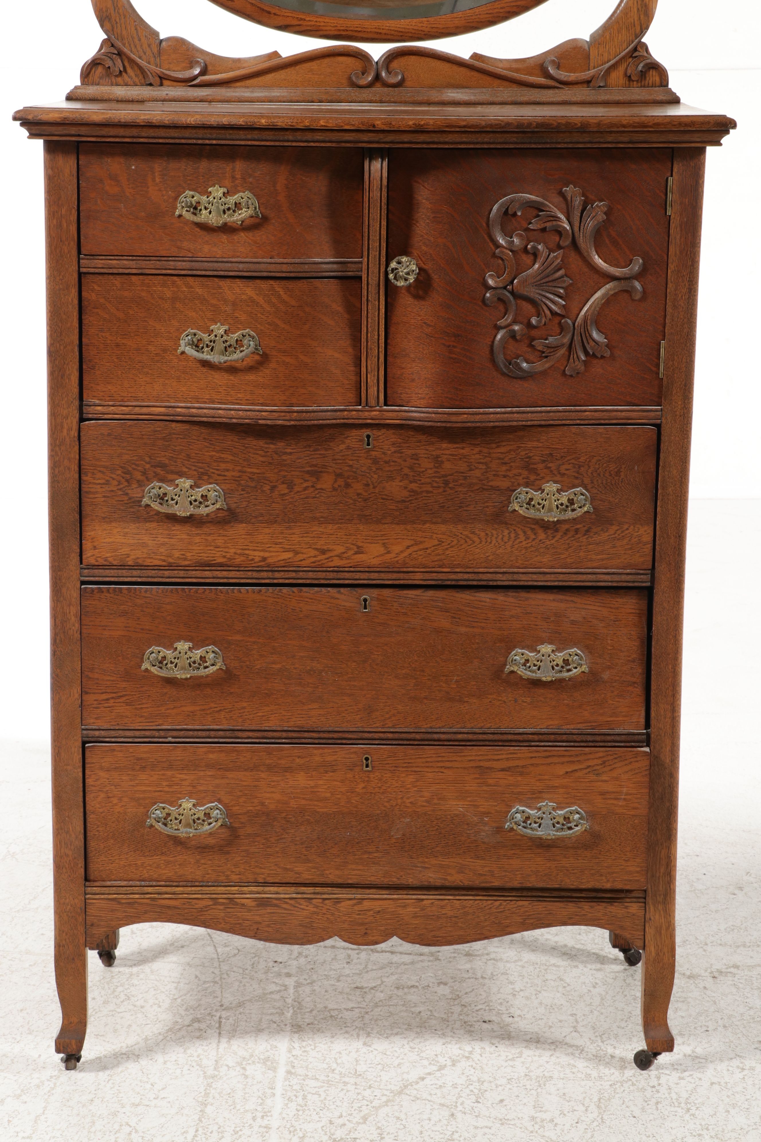 Edwardian Carved Tiger Oak Highboy Dresser with Swivel Mirror, Early 20th C.