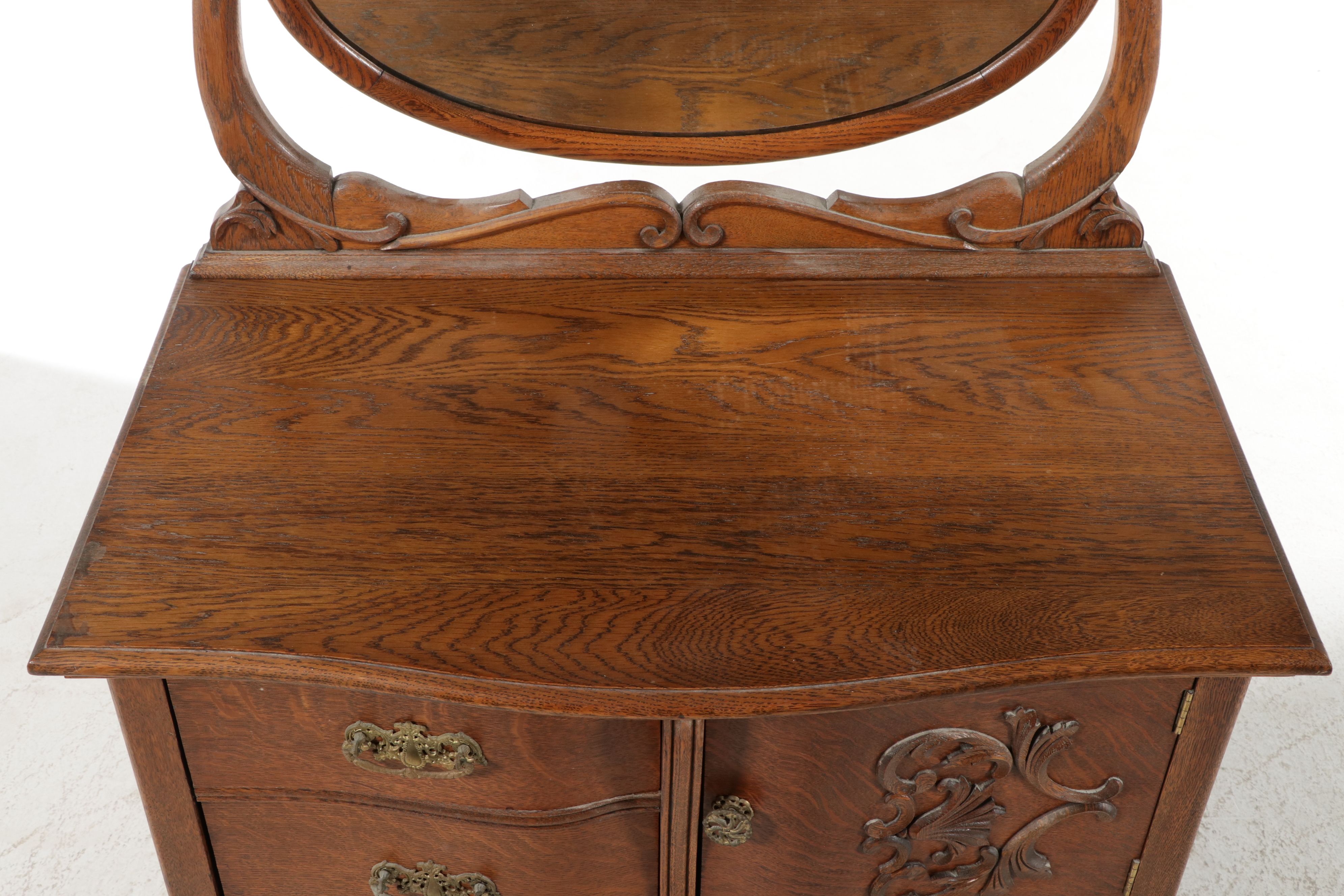 Edwardian Carved Tiger Oak Highboy Dresser with Swivel Mirror, Early 20th C.