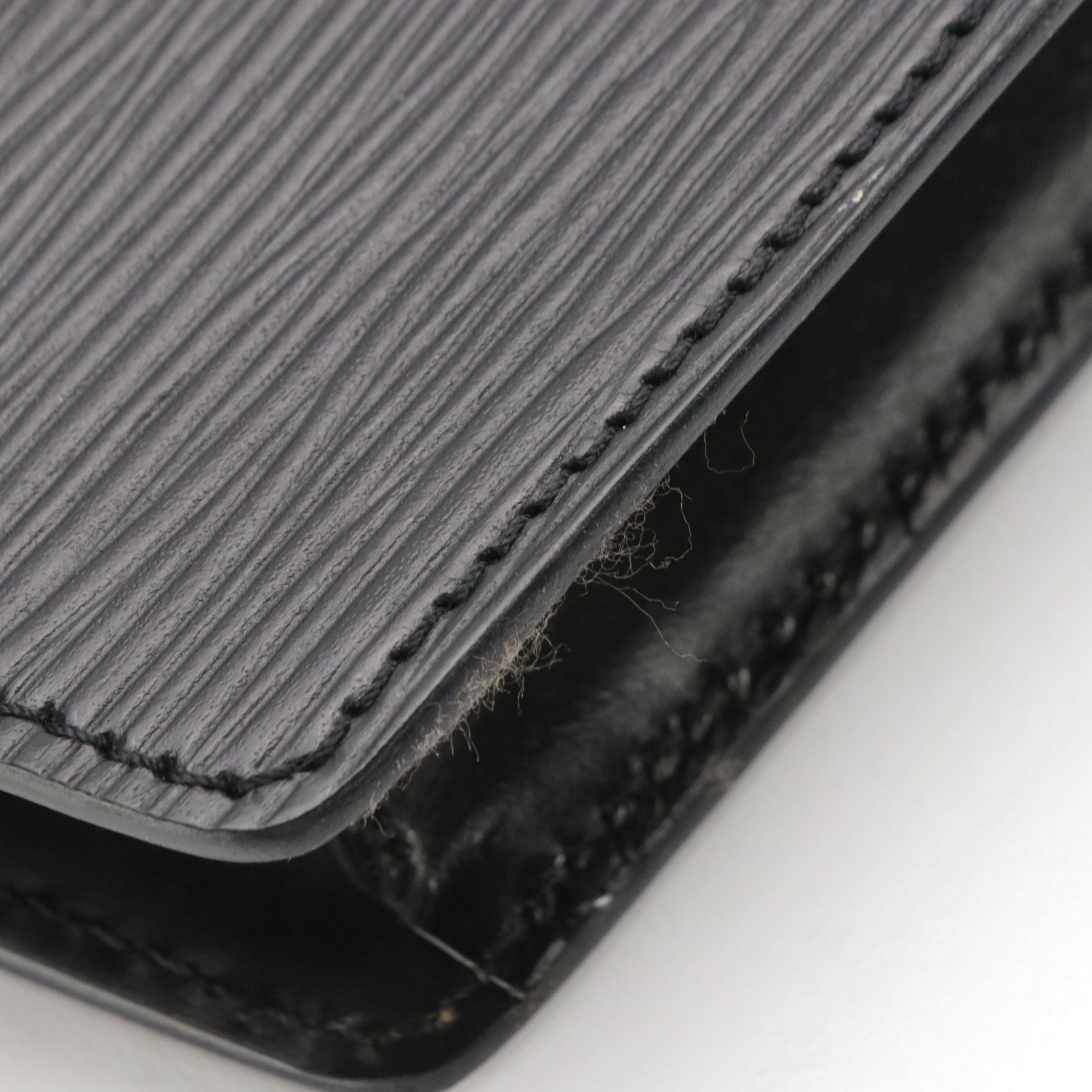 Louis Vuitton Trapeze Clutch in Black Epi and Smooth Leather