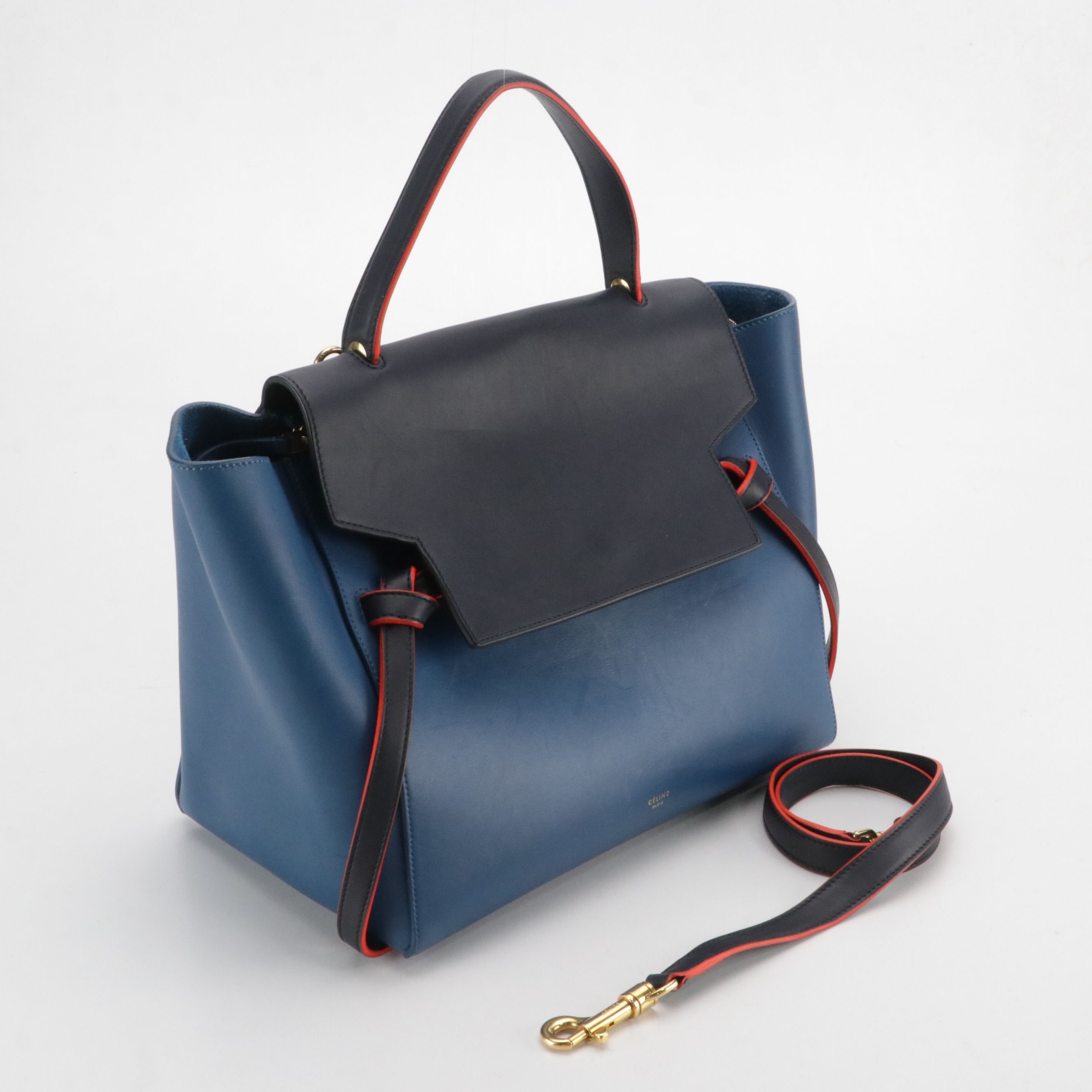 GEMINI: Céline Belt Two-Way Bag in Navy & Marine Blue Leather with Red Trim