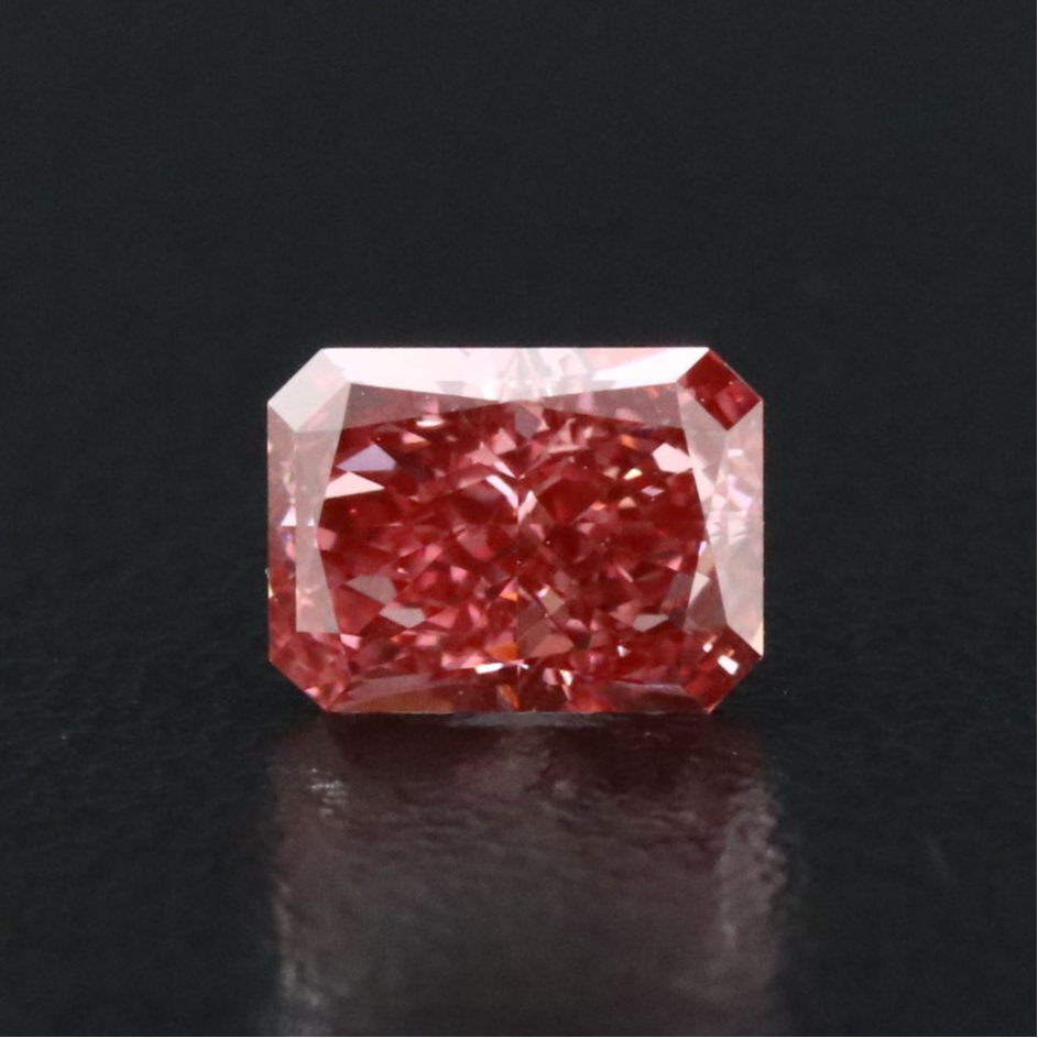 Loose 1.01 CT Fancy Vivid Pink Lab Grown Diamond with IGI Report