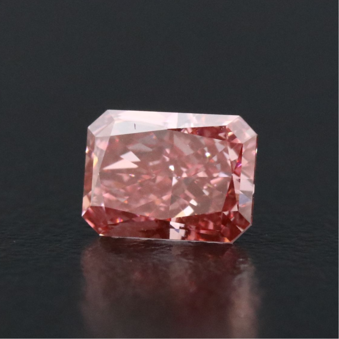 Loose 1.01 CT Fancy Vivid Pink Lab Grown Diamond with IGI Report