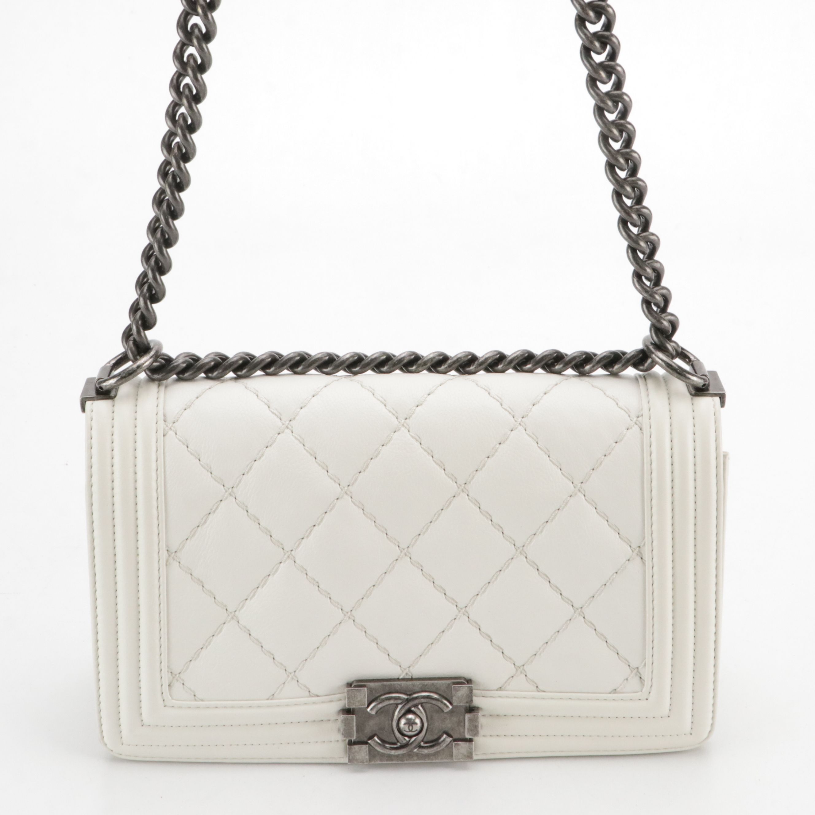 TAURUS: Chanel Boy Flap Bag in White Matelassé Grained Leather