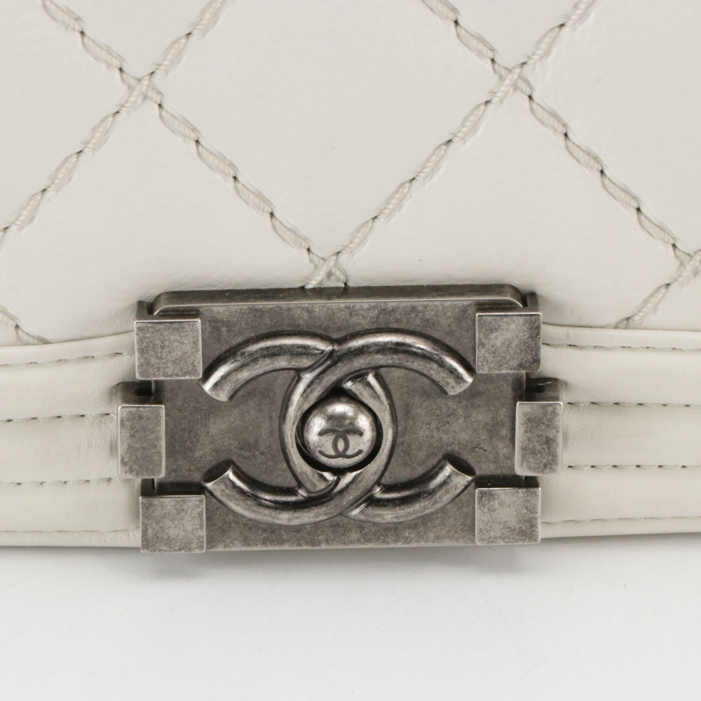 TAURUS: Chanel Boy Flap Bag in White Matelassé Grained Leather