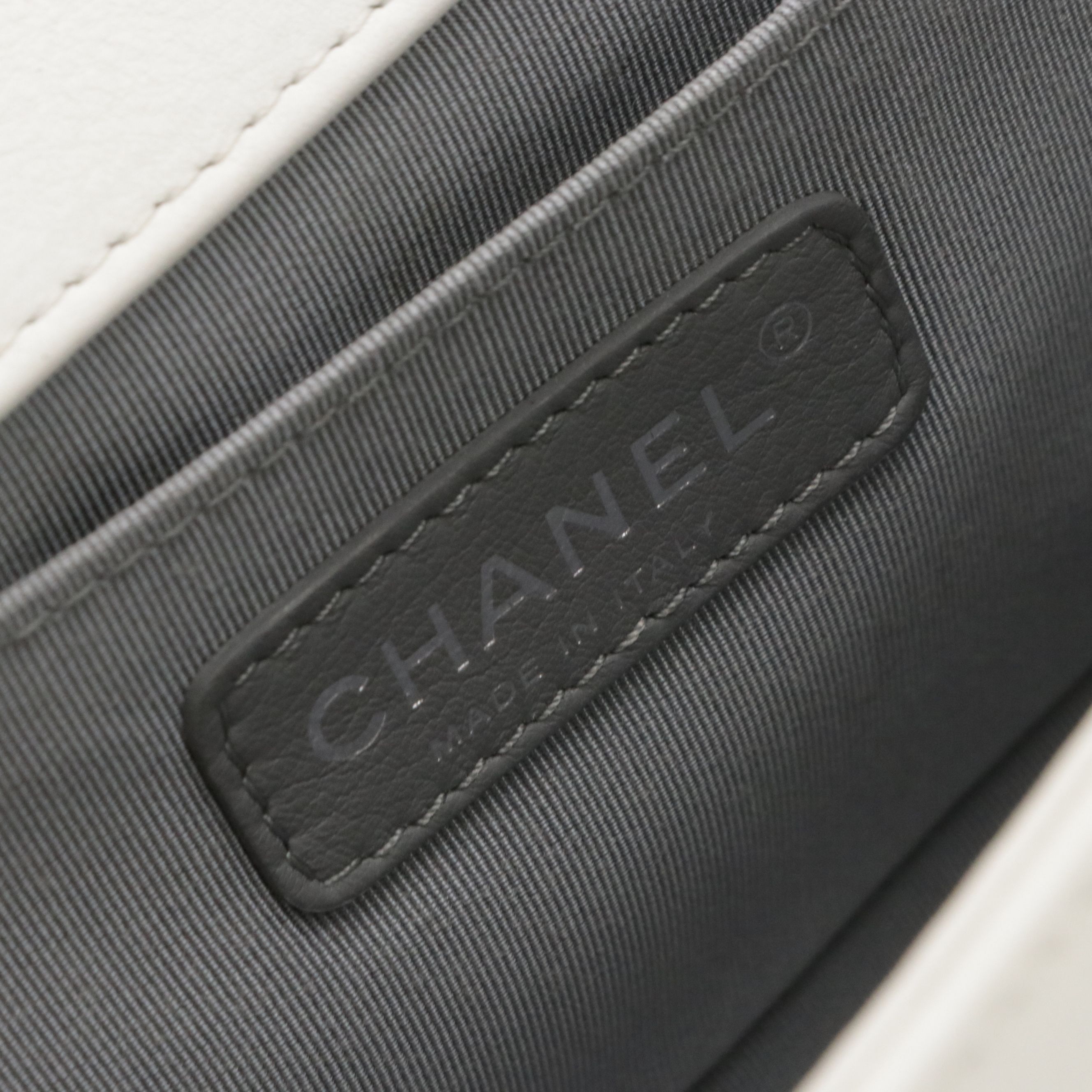 TAURUS: Chanel Boy Flap Bag in White Matelassé Grained Leather