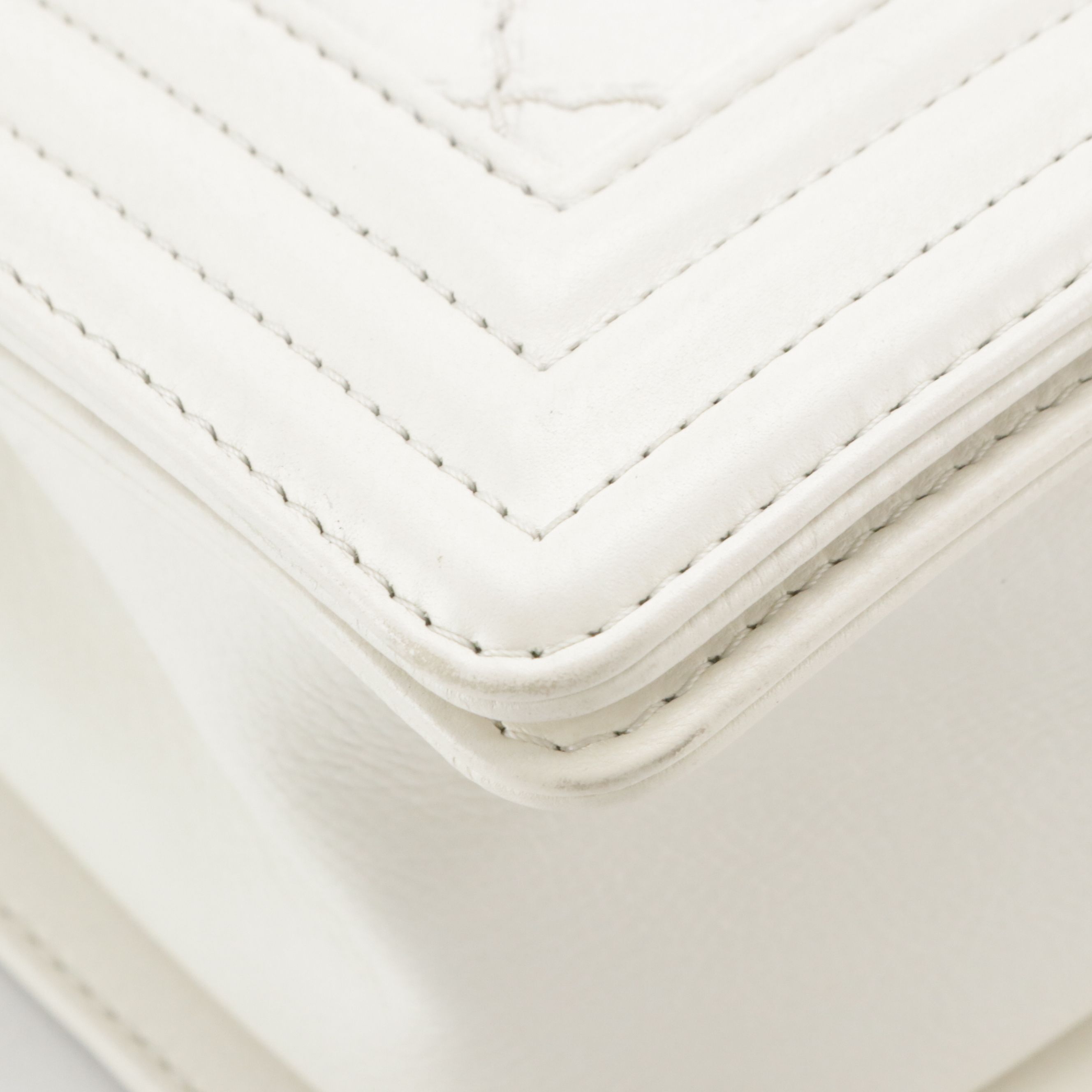 TAURUS: Chanel Boy Flap Bag in White Matelassé Grained Leather
