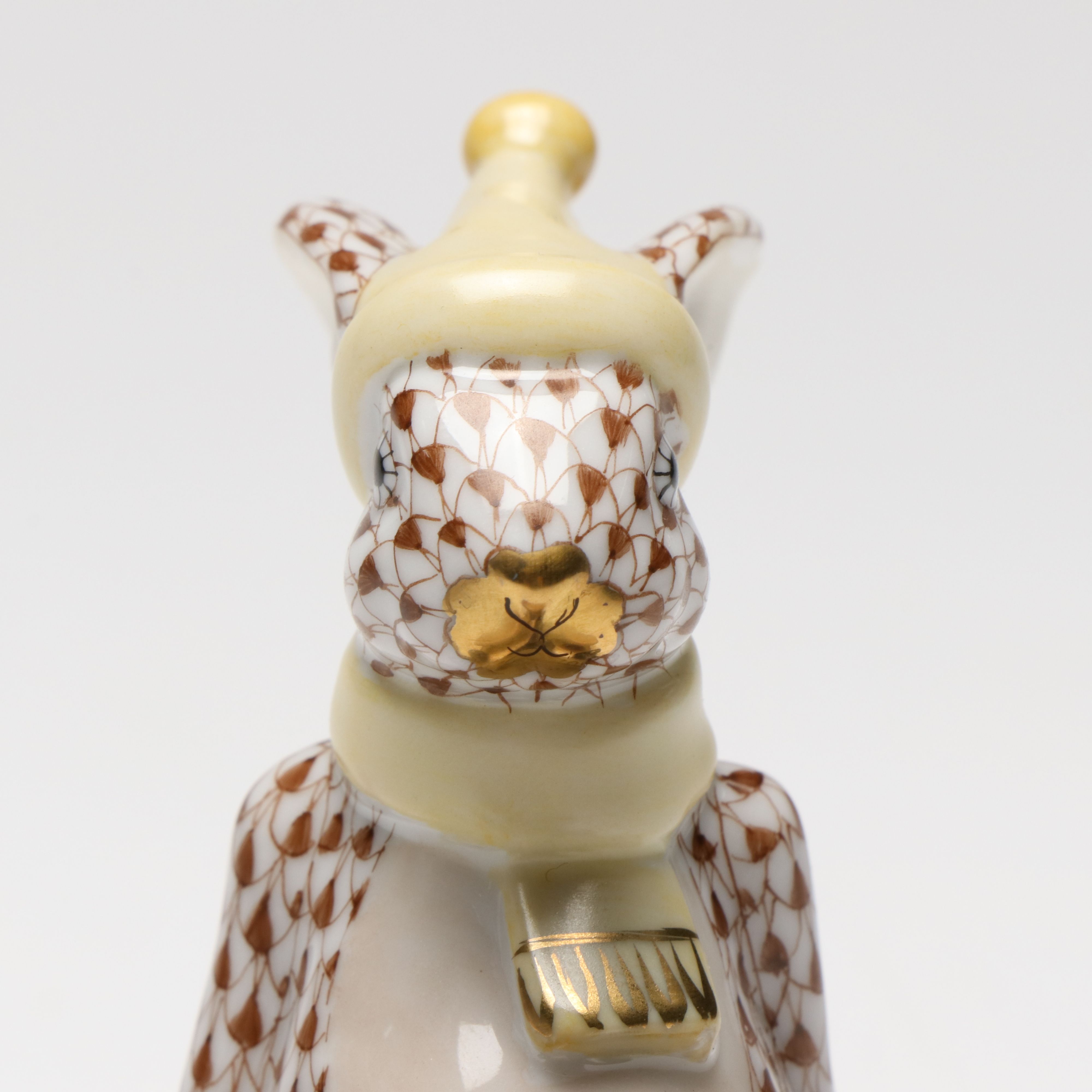 Herend Chocolate Fishnet with Gold "Sledding Bunny" Porcelain Figurine